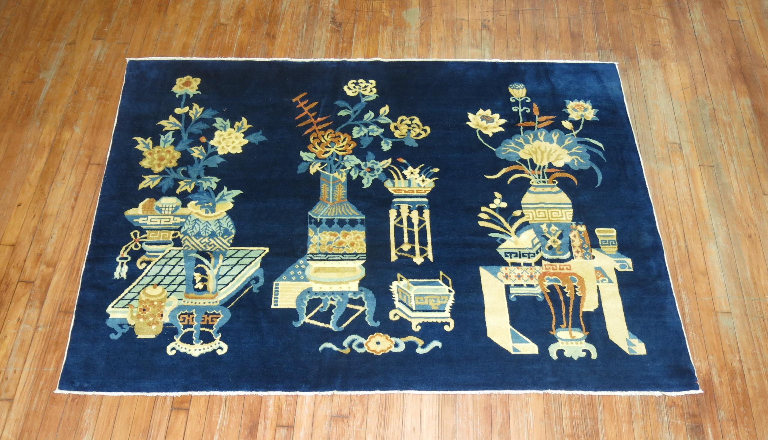 A Chinese pictographic rug in predominant shades blue. The wool is very soft and all the colors are natural. Soft on the feet.