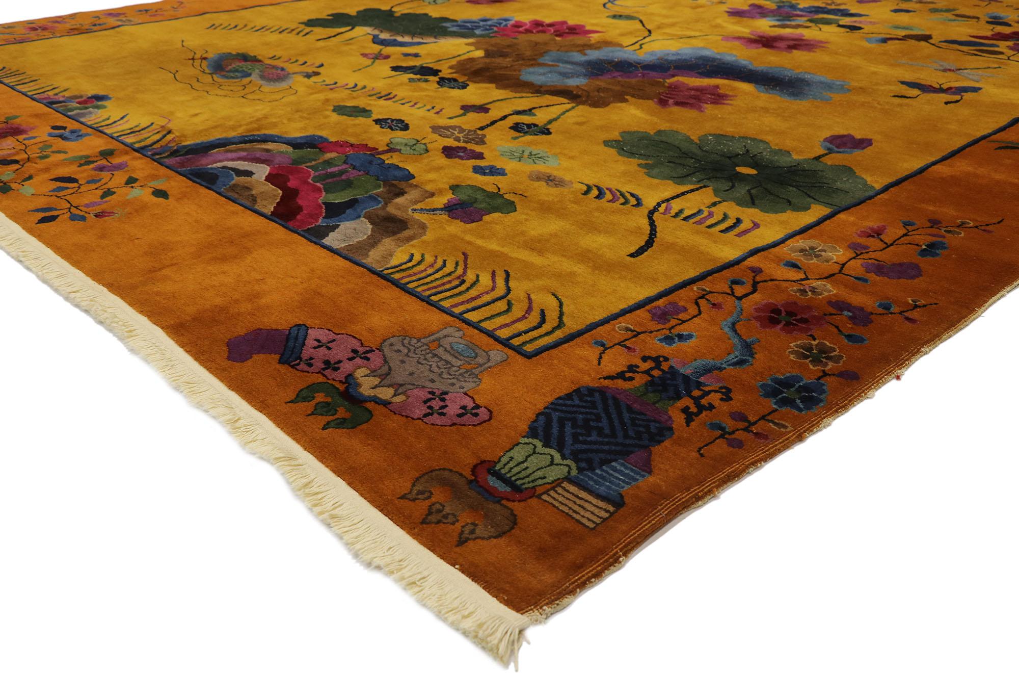 77434, antique Chinese Pictorial Rug with Art Deco style 10'00 x 13'04. This hand knotted wool antique Chinese Art Deco style rug features a gorgeous pictorial plum tree design set against an abrashed field. The plum tree is depicted in peak bloom