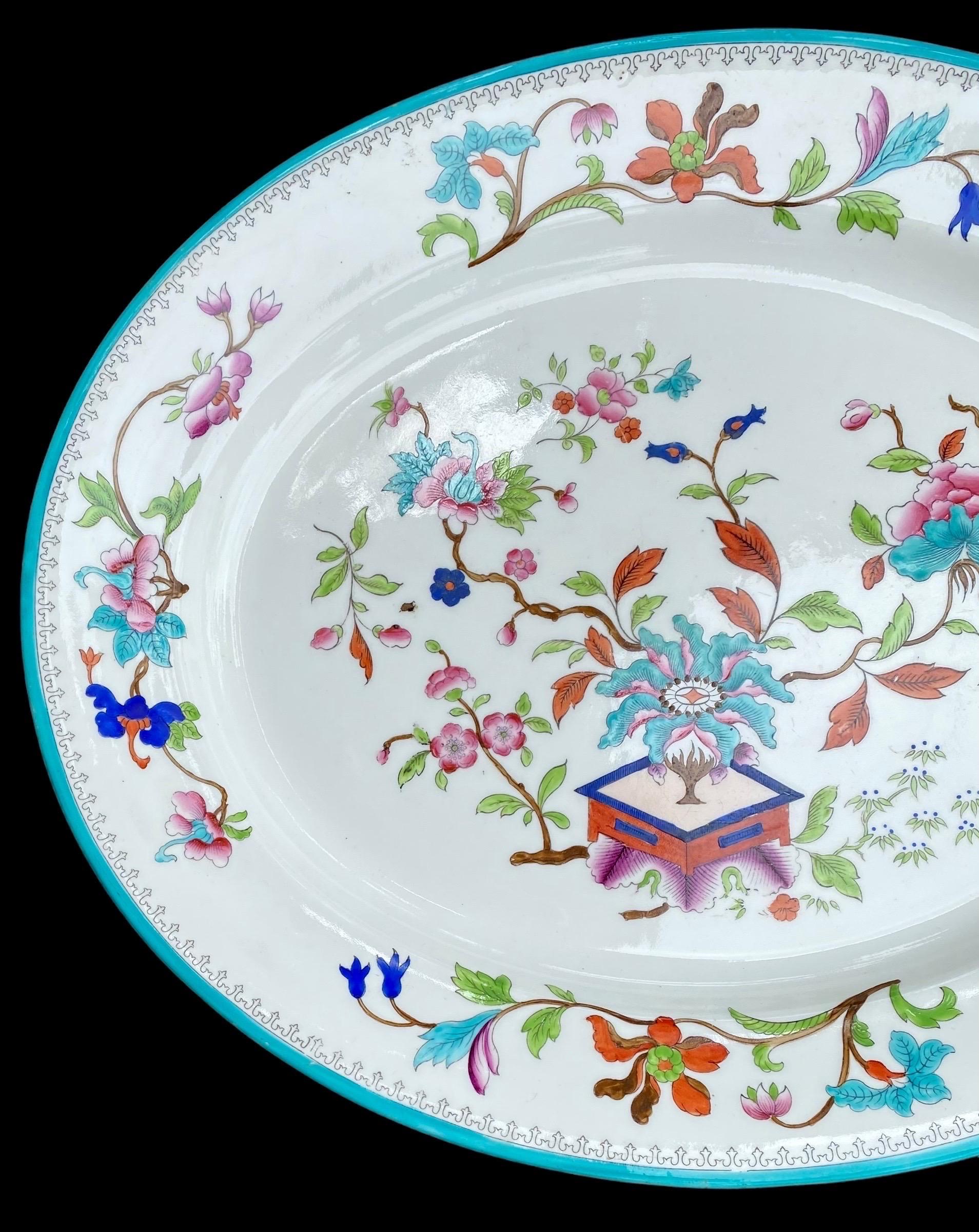 This is a large antique oval meat platter. A Chinese Export porcelain hand painted serving plate, circa 1900-1920

A beautifully rendered Chinese export decorative serving plate of generous proportion.
Gently used and in good condition.

Fine off