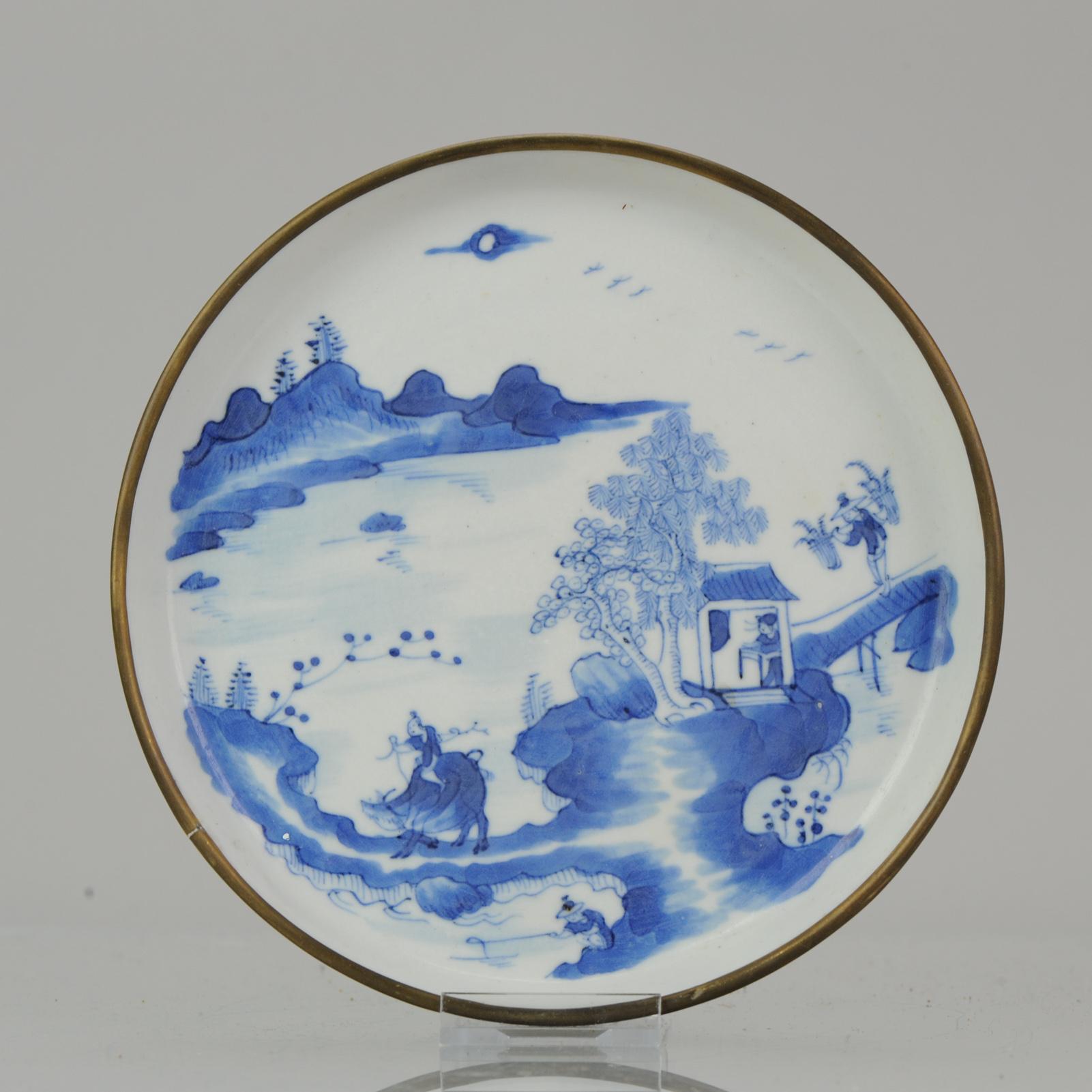 Description

A top quality dish of Bleu de Hue porcelain. The interior painted with a scene from with a boy and ox in landscape. Two other figures are also painted, 1 crossing a bridge and 1 in a small house. China, 19th century. For the