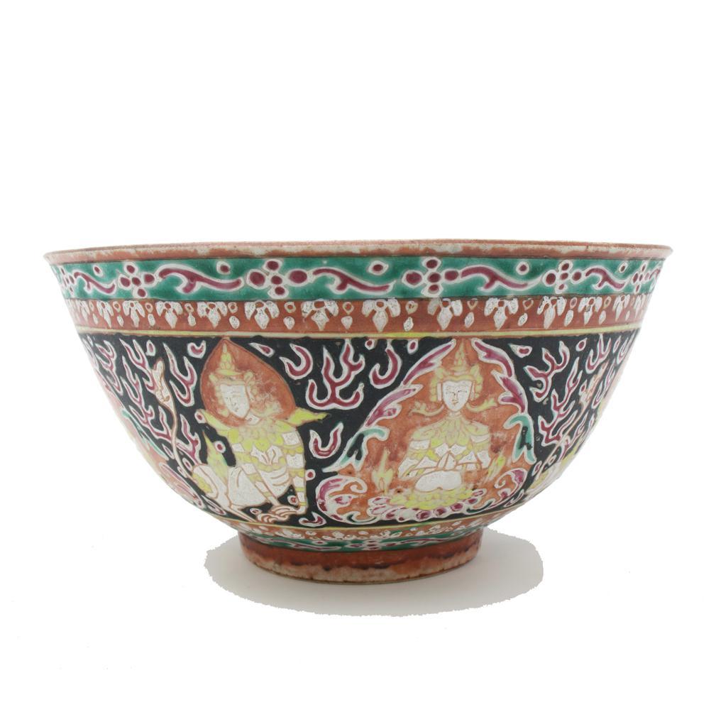 Antique Chinese Porcelain Bowl for the Thai Market, 18th century.
Bencharong enamel decoration with Buddhist imagery on a black background. This classic porcelain bowl form having a raised narrow foot rim and slightly everted mouth rim is richly