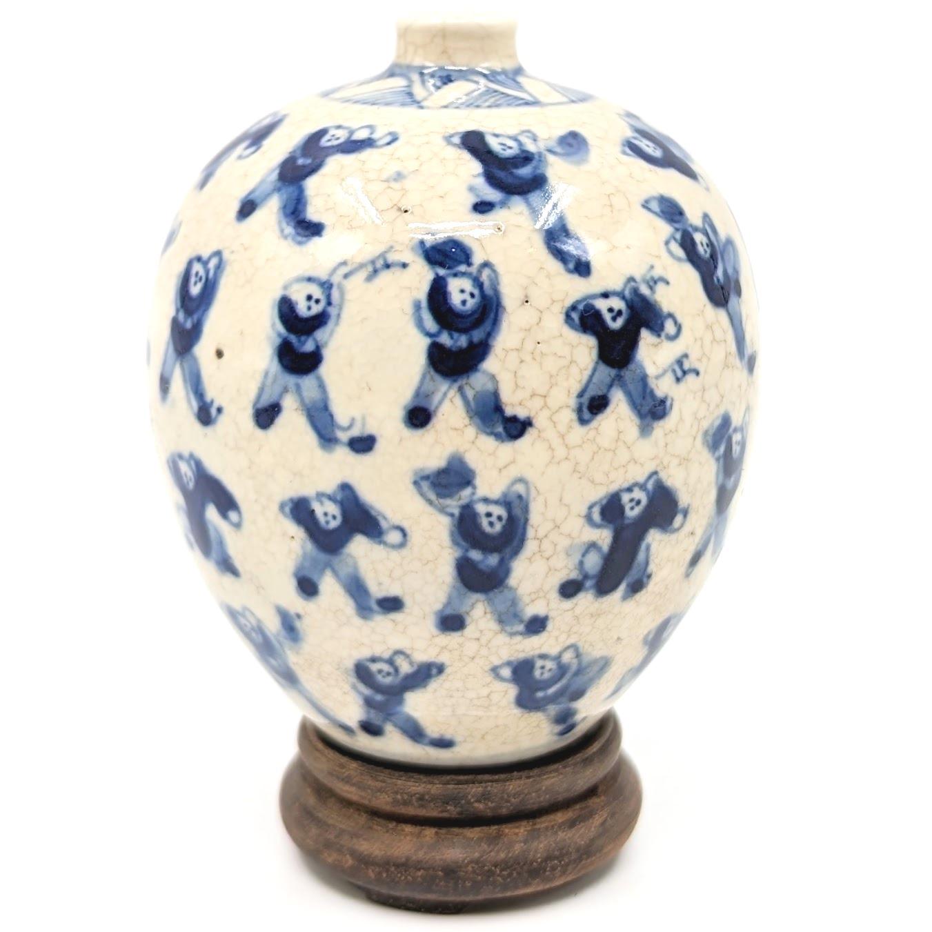 Antique Chinese porcelain snuff bottle in ovoid form, painted in underglaze blue and white in 