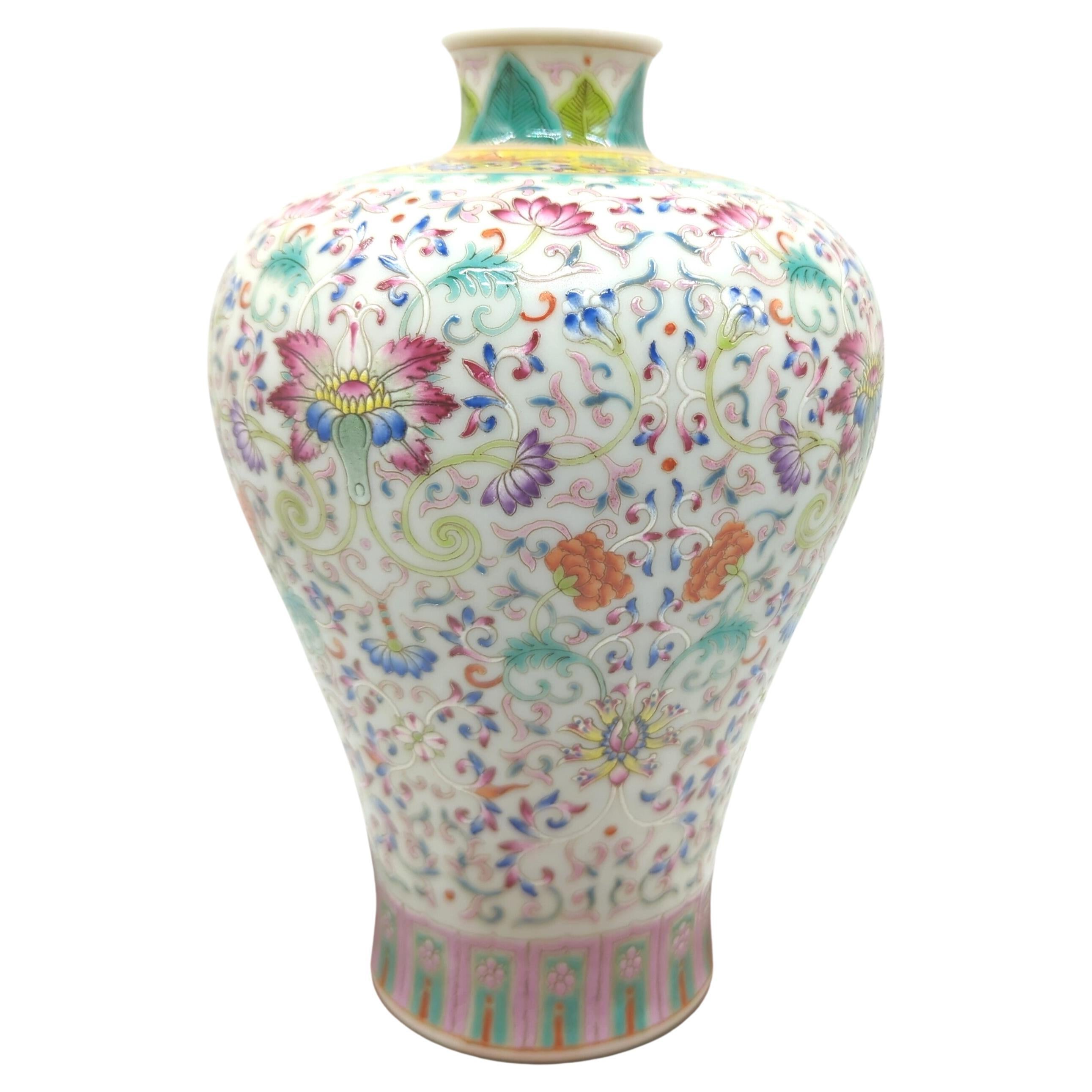 We are delighted to offer this exquisite early 20th-century Republic of China period Meiping vase, a remarkable example of the fencai famille rose technique. This vase stands as a testament to the unparalleled craftsmanship and artistic ingenuity of