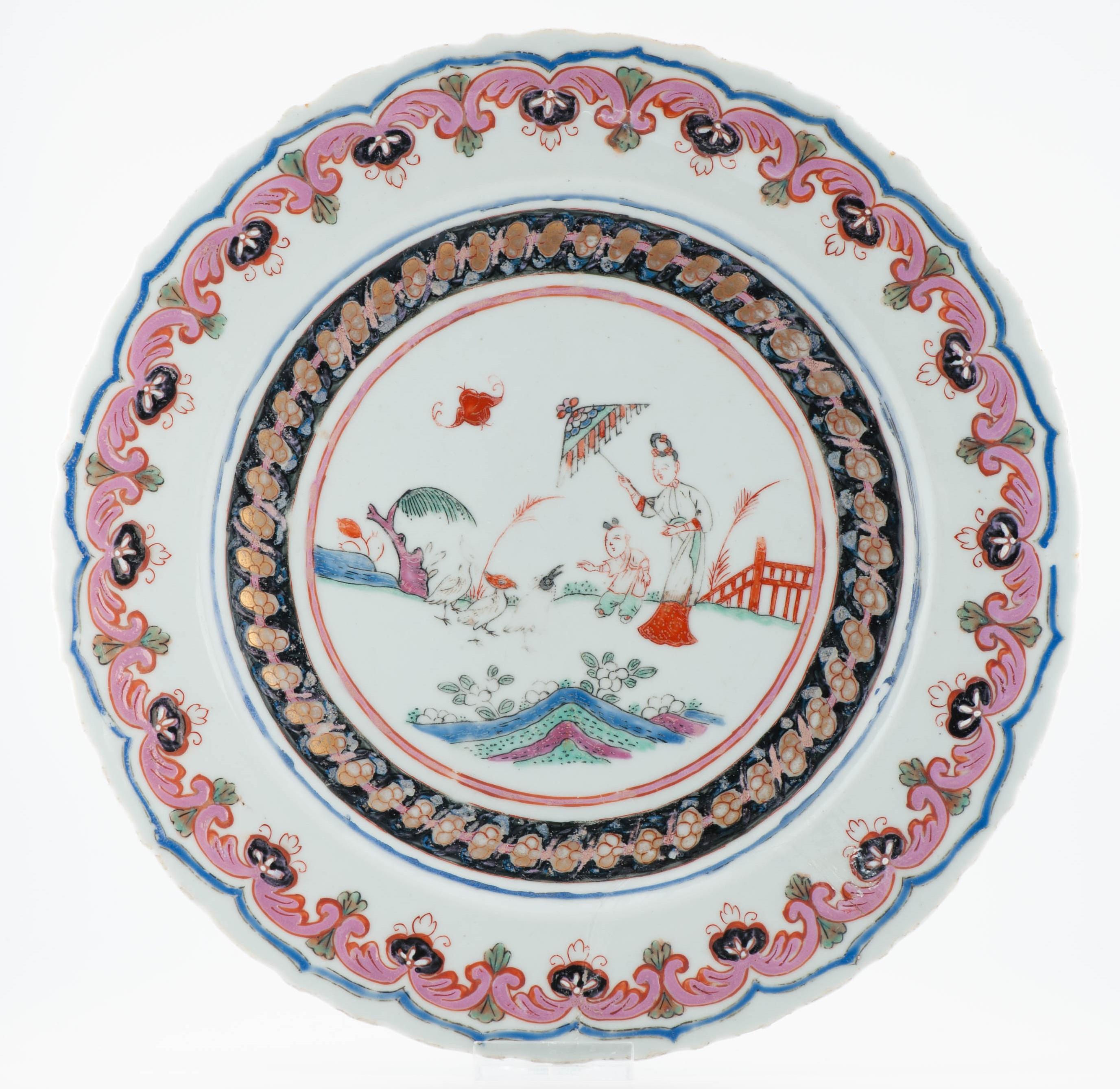 

Sharing with you this lovely, probably Yongzheng period, dish in Famille Rose palette.
A very unusual Pronk Dame au parasol version. Pink with rare overglaze blue and black. I think it would be fully Chinese painted with these colors appearing in