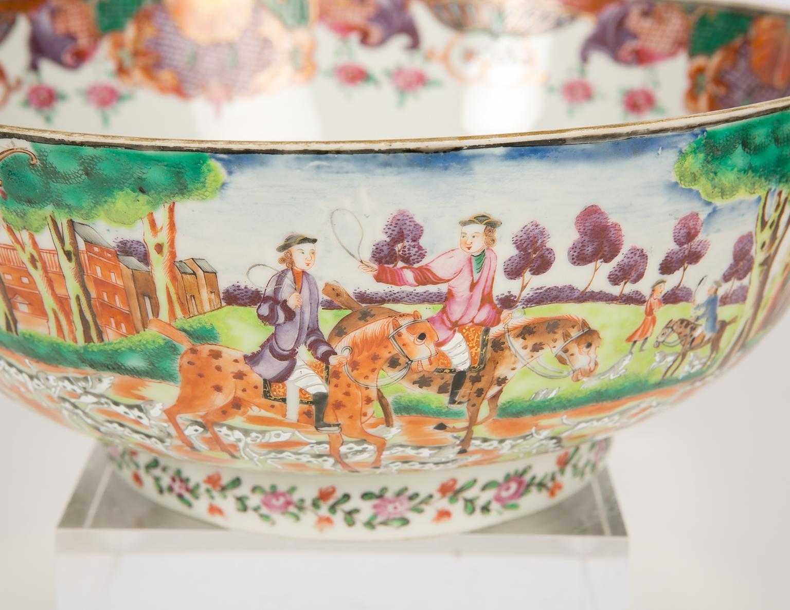 WHY WE LOVE IT: The Horses! the Riders!
We are pleased to offer this exquisite Chinese porcelain hunt bowl painted in Famille Rose over-glaze enamels. The strong color palette and rich decoration are hallmarks of Chinese export hunt bowls of the