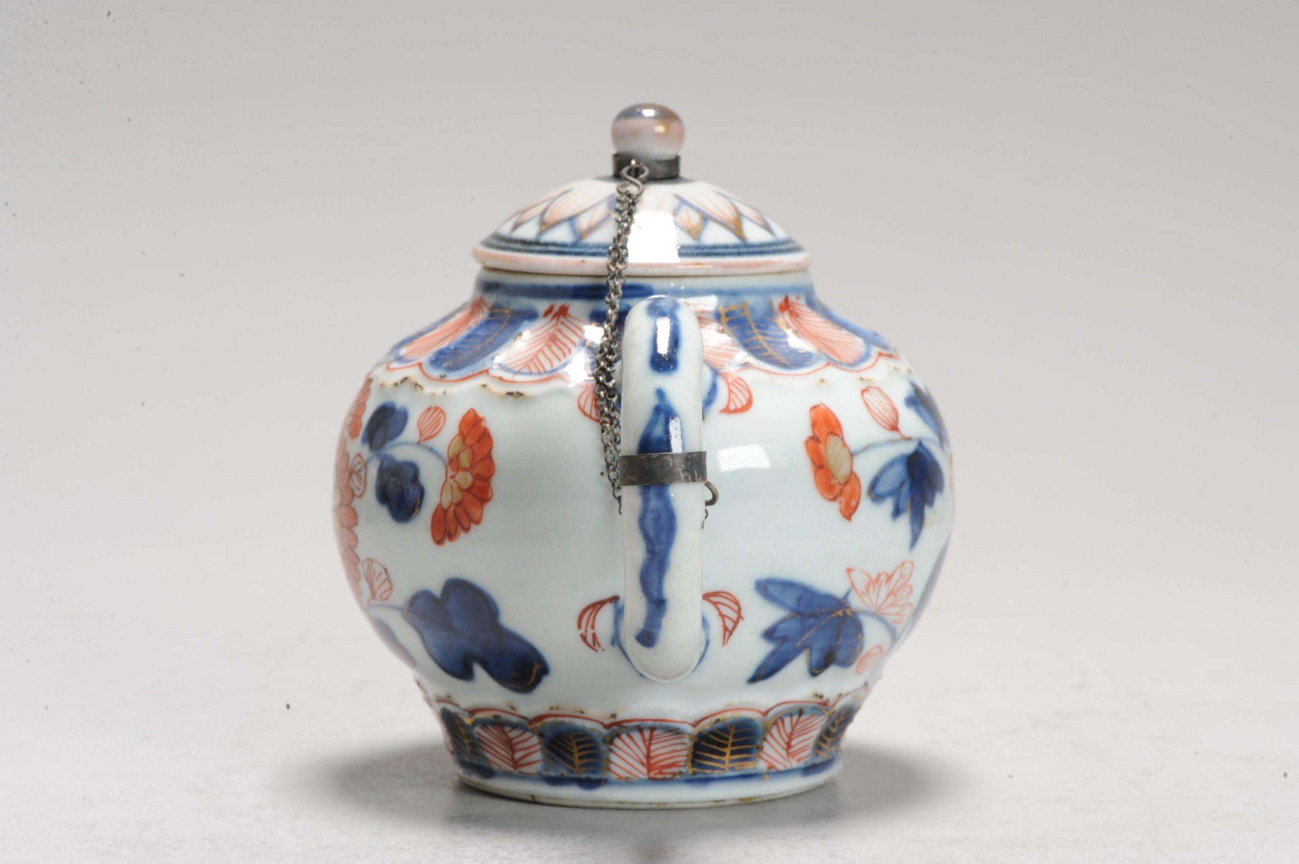 A very nicely decorated teapot.  Kangxi period. Great decoration in Imari palette.

Additional information:
Material: Porcelain & Pottery
Decoration Type / Colour: Polychrome
Region of Origin: China
Emperor: Kangxi (1661-1722)
Period: 17th century,
