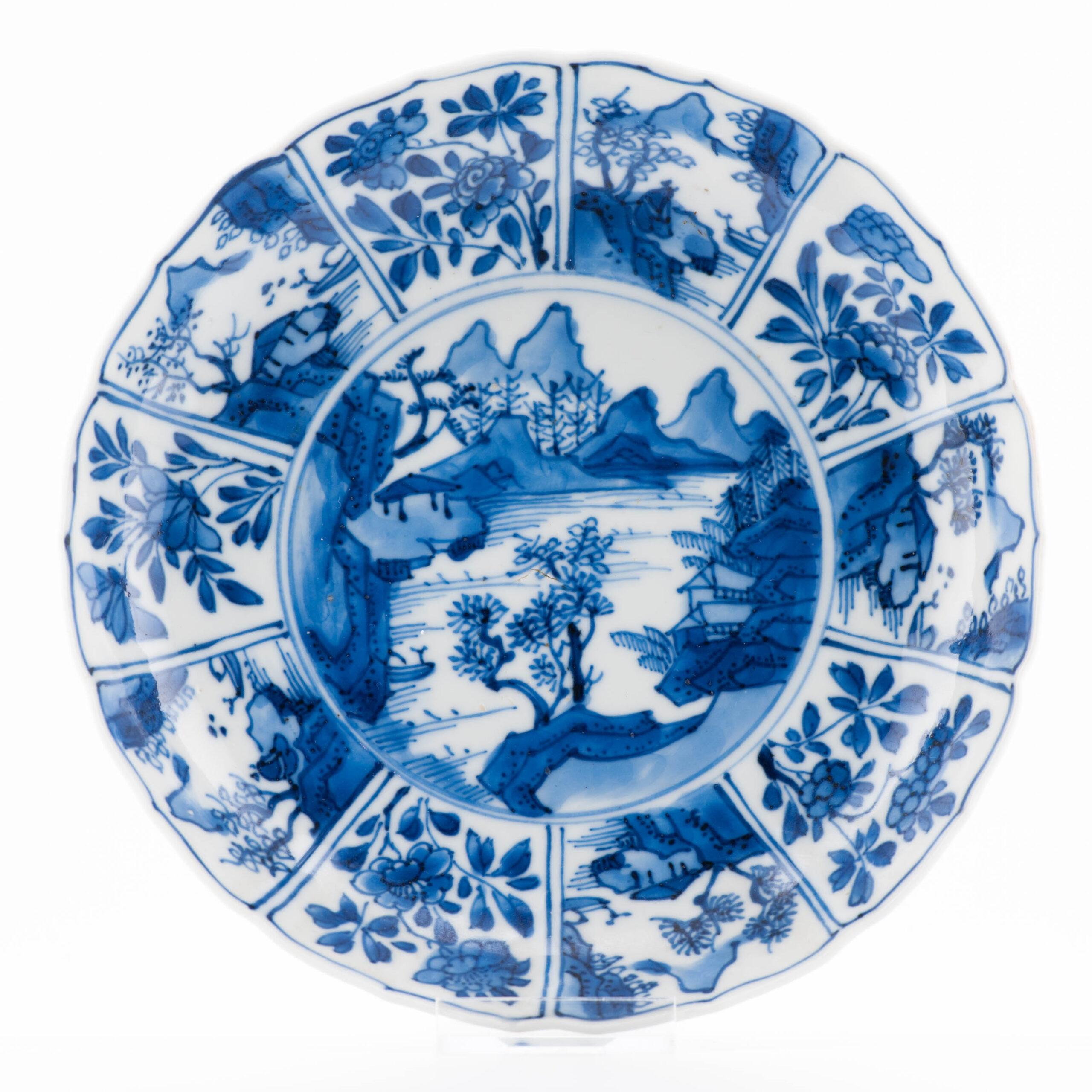 A lovely Kangxi period Plate dating to around 1690-1710. Landscape scenes at the base also. Marked at base with an incense burner mark.
Period: Kangxi
Country of origin: China⁠

Condition
2 lines from rim. Size: 17x3.2CM DiameterxHeight
Period
17th