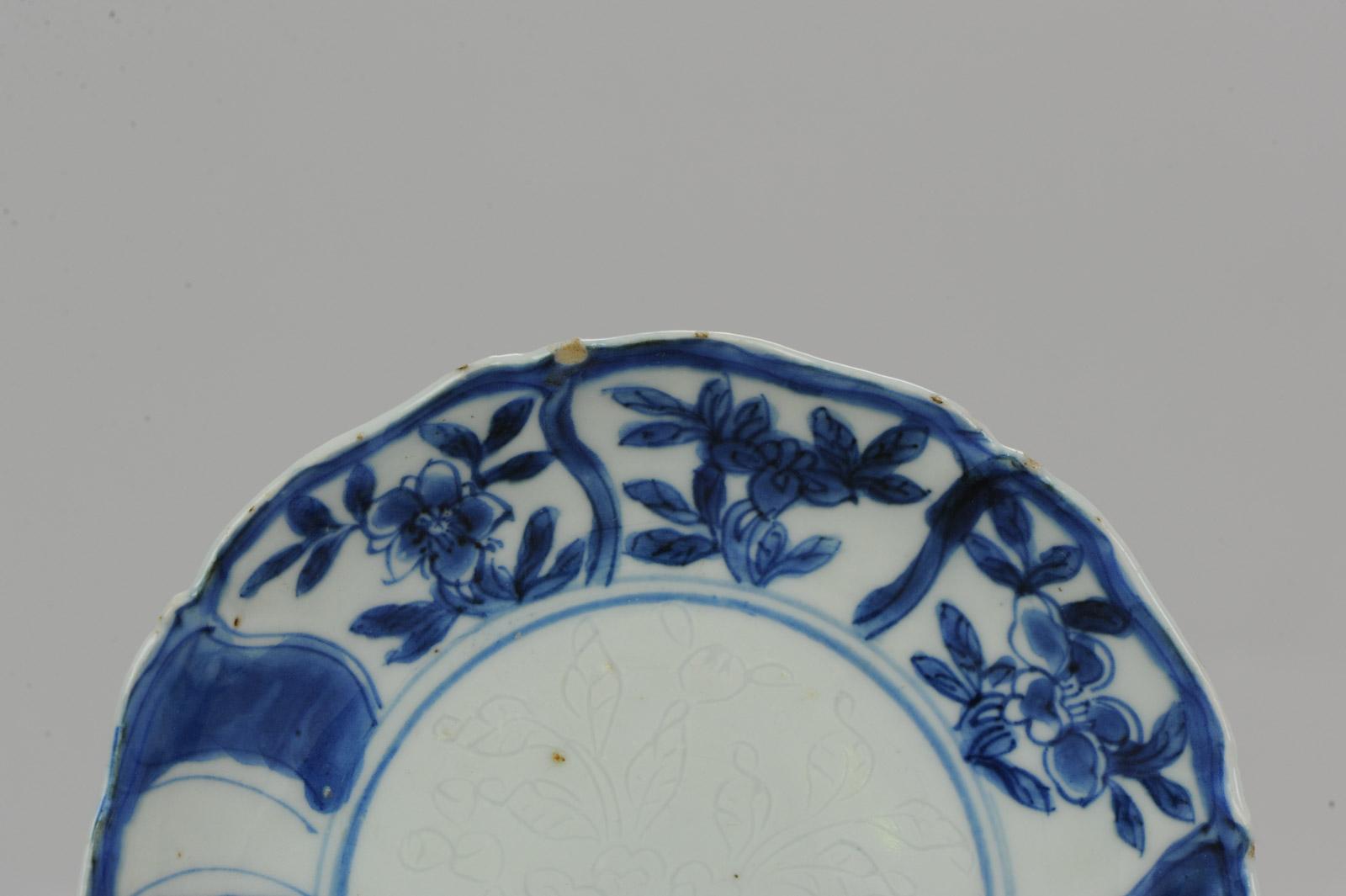 A Blue & White late ming / transitional plate with a nice and rare anhua decoration

Additional information:
Material: Porcelain & Pottery
Region of Origin: China
Period: 17th century Transitional (1620 - 1661)
Age: Pre-1800
Condition: Overall
