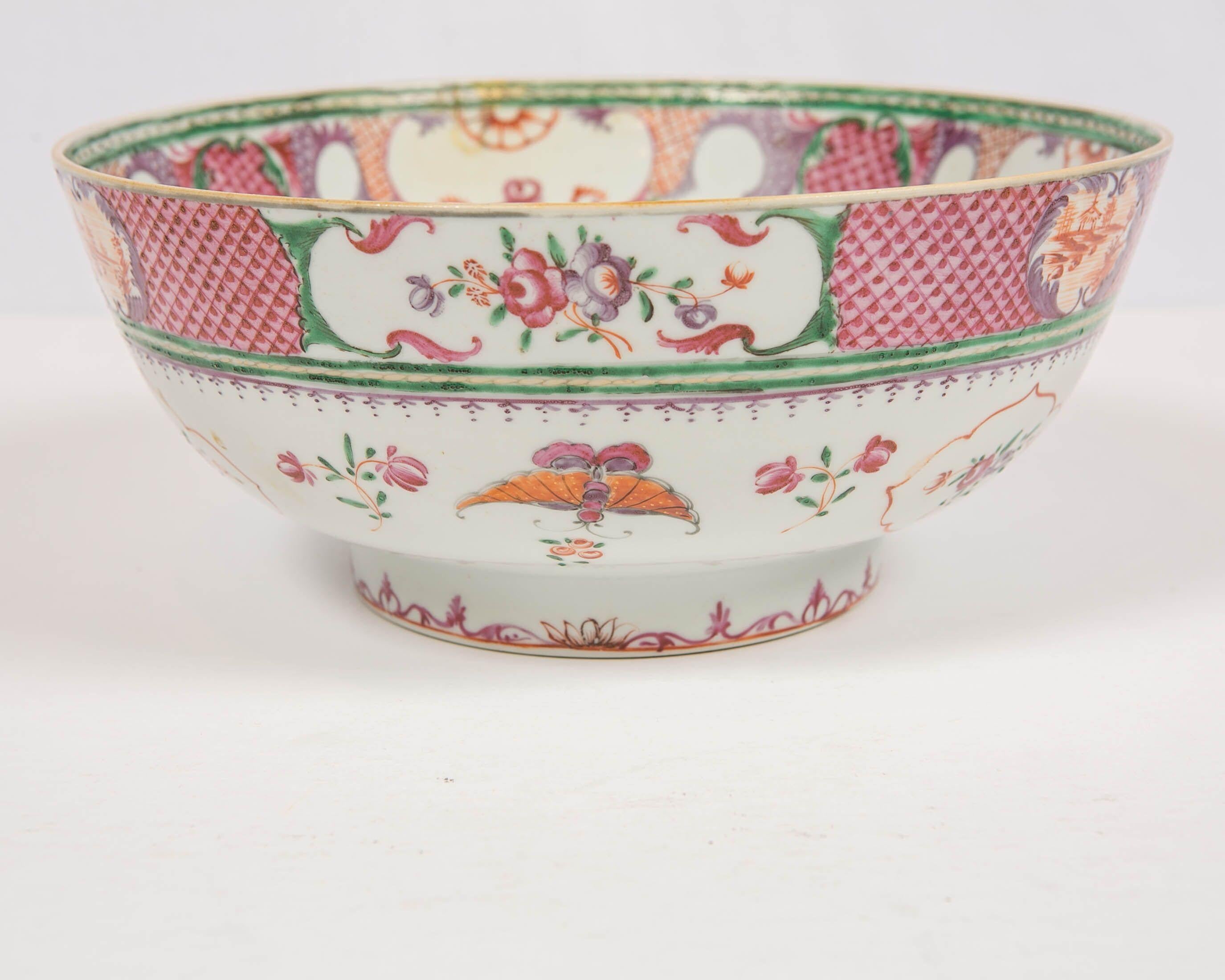 We are pleased to present this lovely Chinese porcelain punch bowl decorated with colorful hand-painted designs. Made circa 1820 this large bowl (10.35