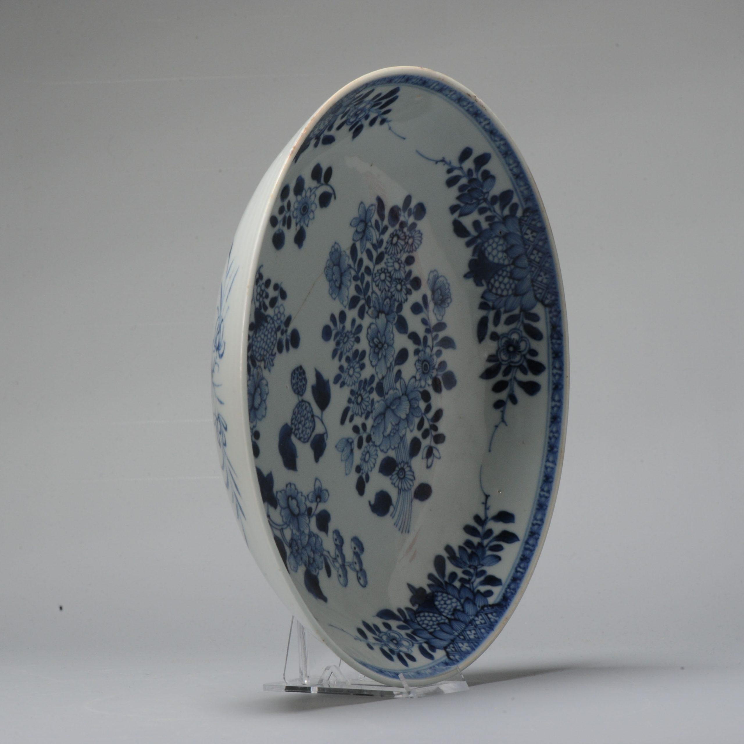 A very nice, richly decorated deep plate.

Additional information:
Material: Porcelain & Pottery
Type: Plates
Color: Blue & White
Region of Origin: China
Emperor: Qianlong (1735-1796)
Period: 18th century Qing (1661 - 1912)
Age: Pre-1800
Condition: