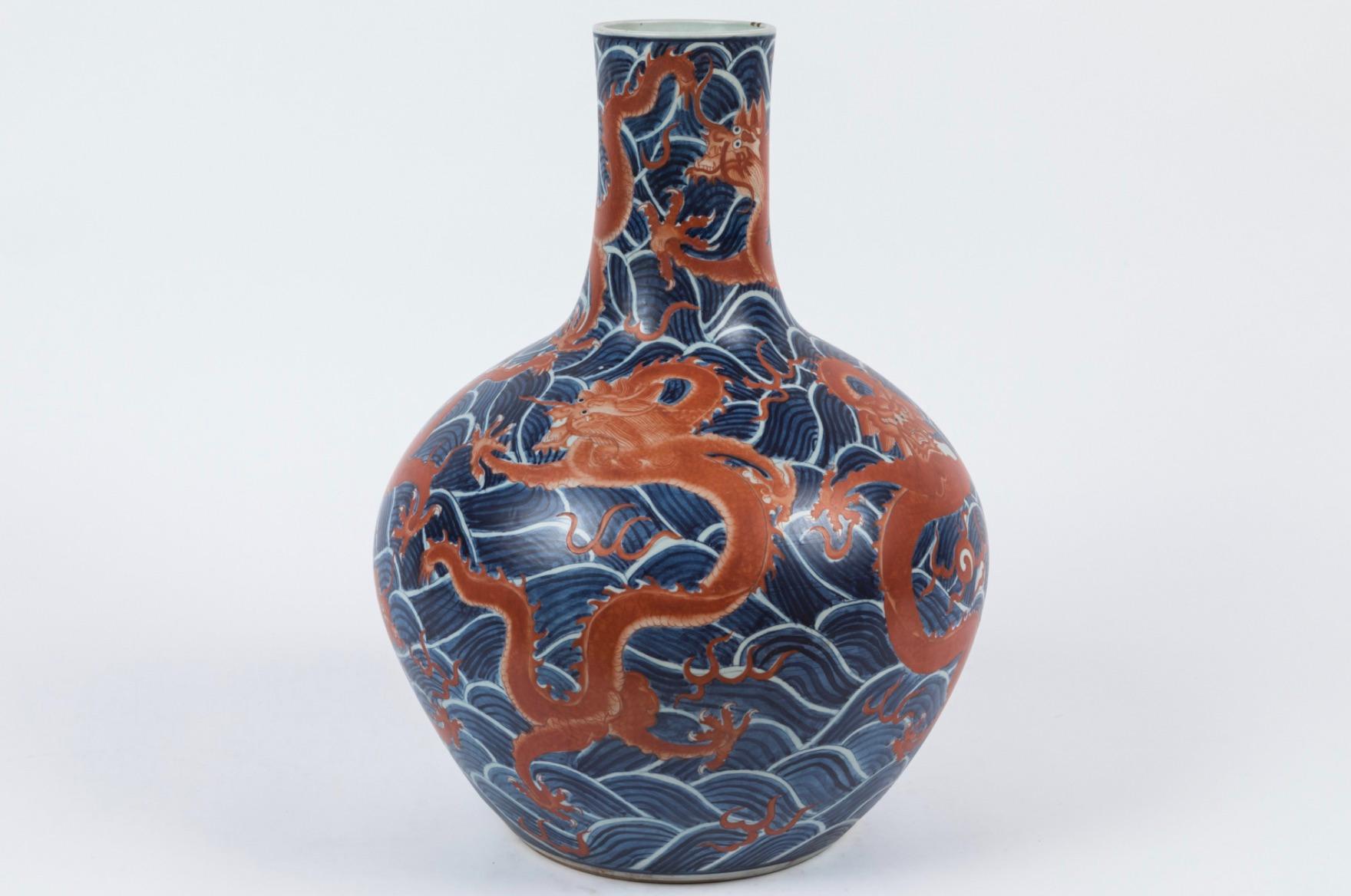 Antique blue and red, Chinese export porcelain vase, with wooden stand,
1920s.