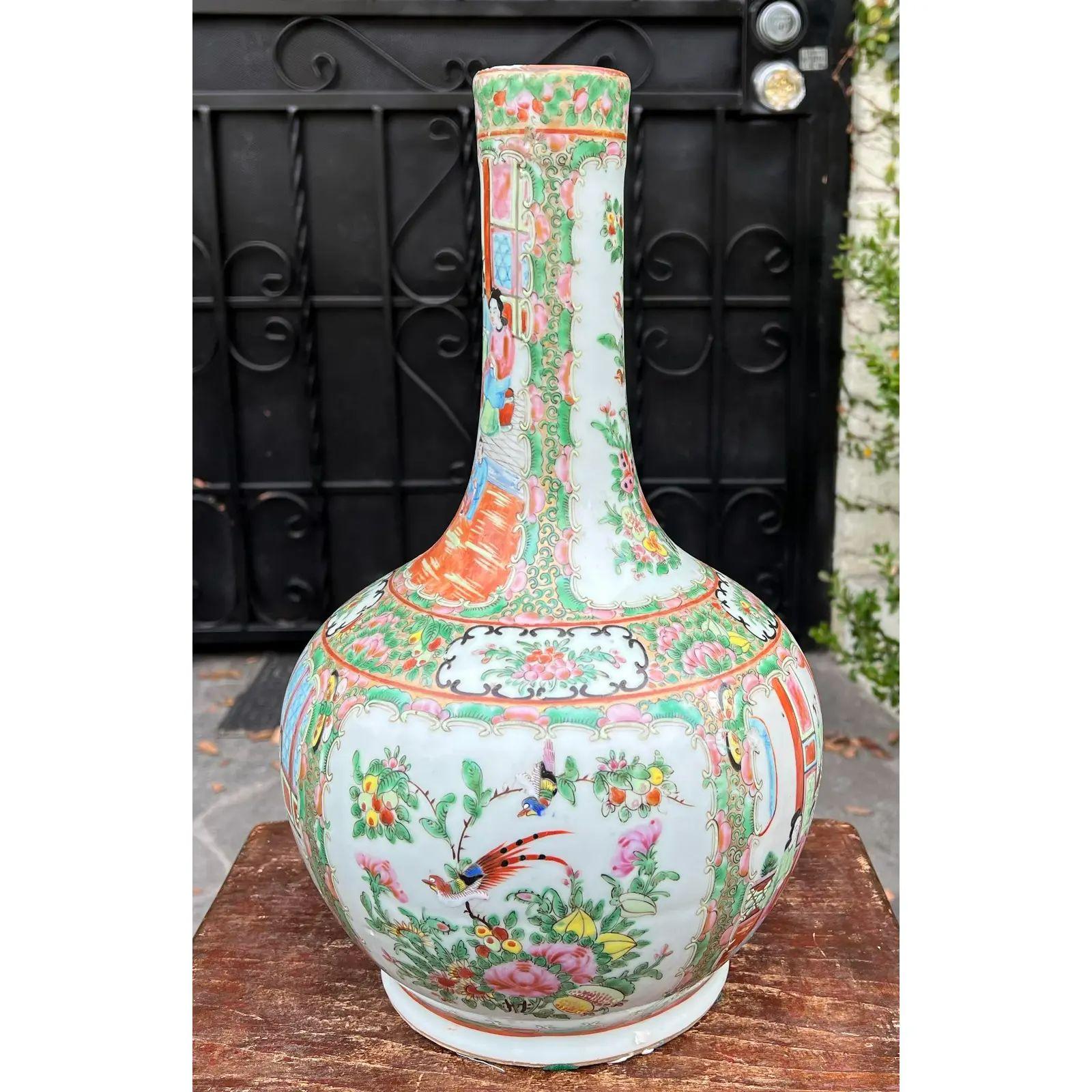 Antique Chinese Rose Medallion bottle vase. It is beautifully hand painted and features scenic medallions flanked by floral decoration.

Additional information: 
Materials: Ceramic
Color: Ivory
Period: early 19th century
Styles: Chinese
Item