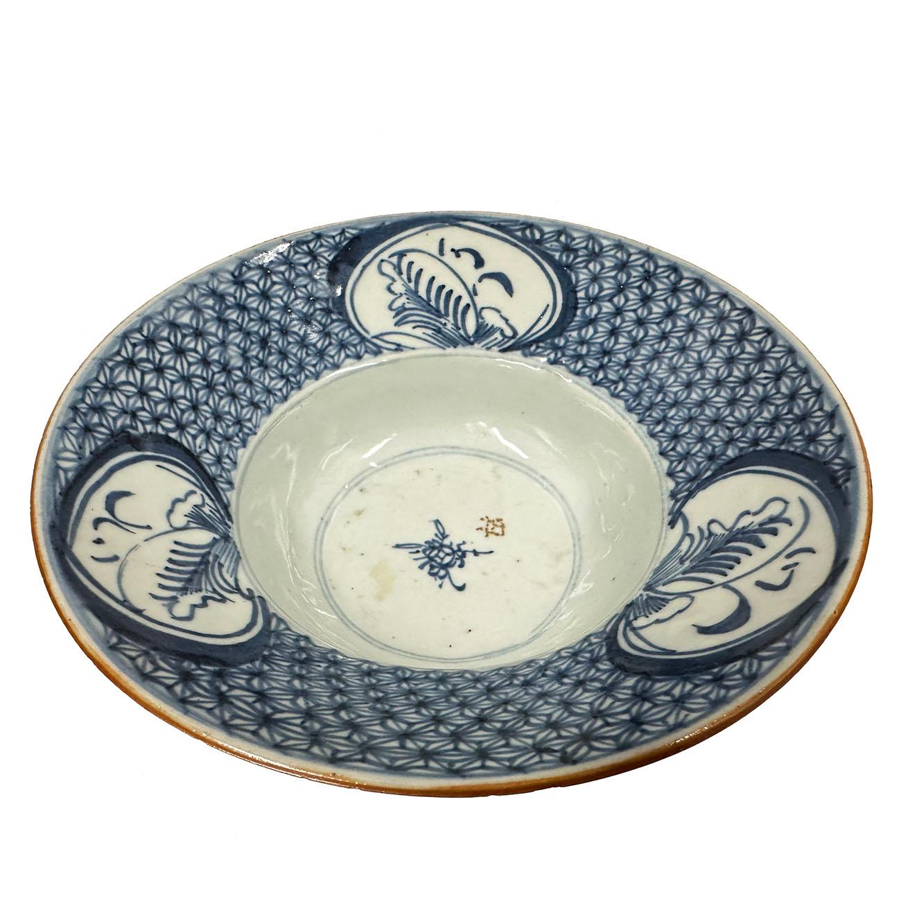 

This antique Chinese porcelain bowl is a rare find from the Qing Dynasty, featuring delicate blue and white patterns. Crafted from high-quality porcelain and pottery, this bowl is an authentic antique original from the 1800s. Its intricate design