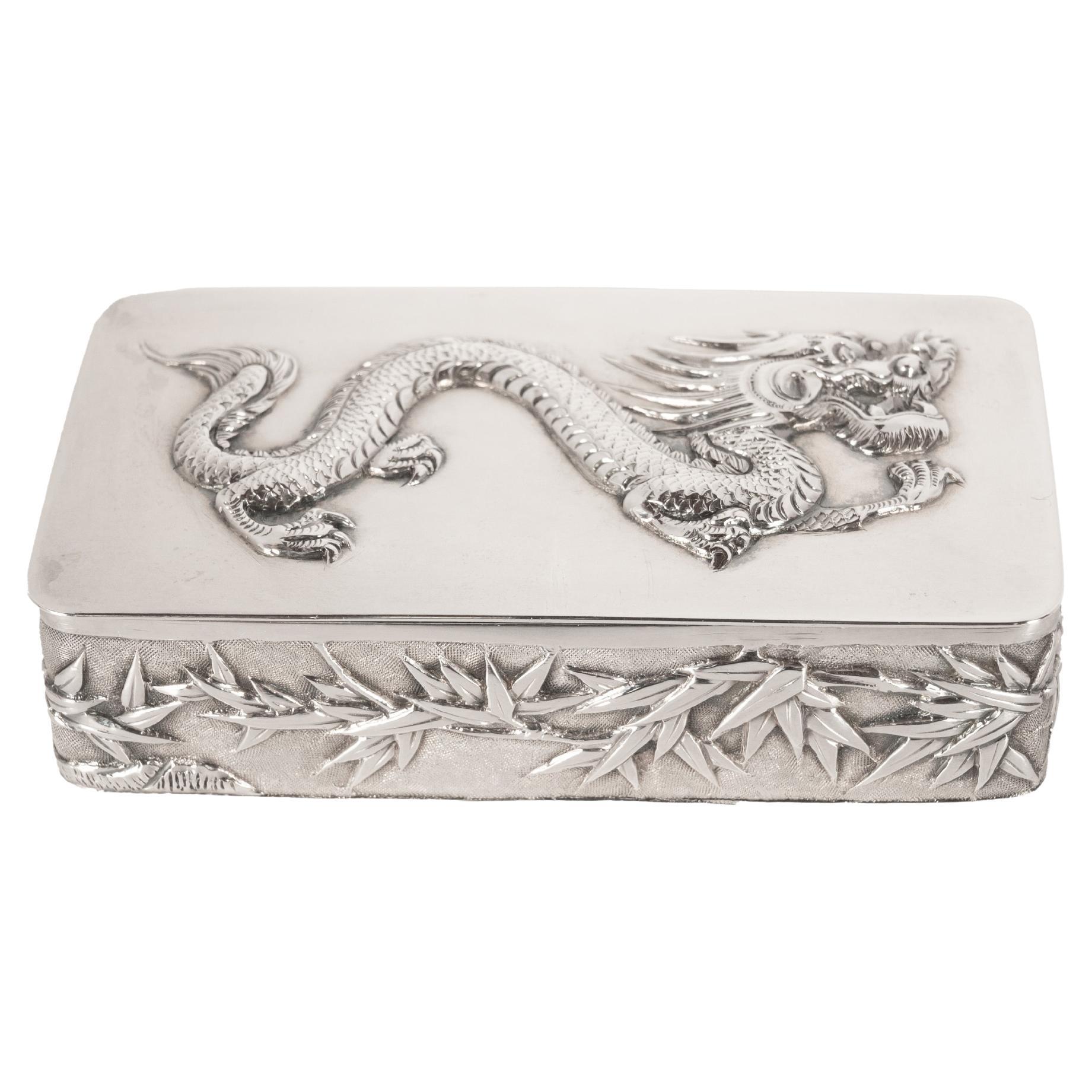 A good antique Chinese Qing dynasty silver dragon snuff box by Luen Hing (Shanghai) and retailed by Wang Hing & Co, Canton, circa 1900, the box most likely made for the Japanese market.

This very elegant silver box having a hinged lid which is