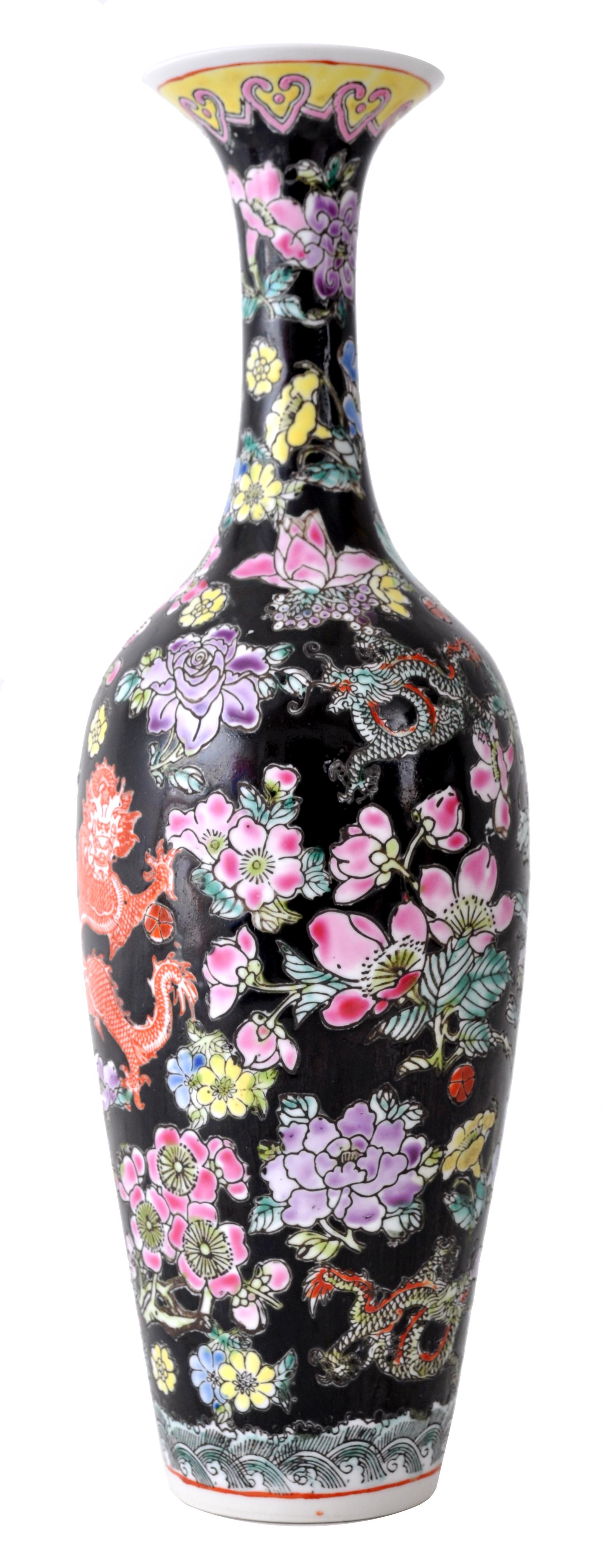 Antique Chinese Qing Dynasty Imperial Famille Noir Porcelain vase, circa 1890. This bottle shaped vase with an elongated flared neck is made of the very finest 'egg shell' porcelain. The vase having a yellow collar and an all-over enameled floral