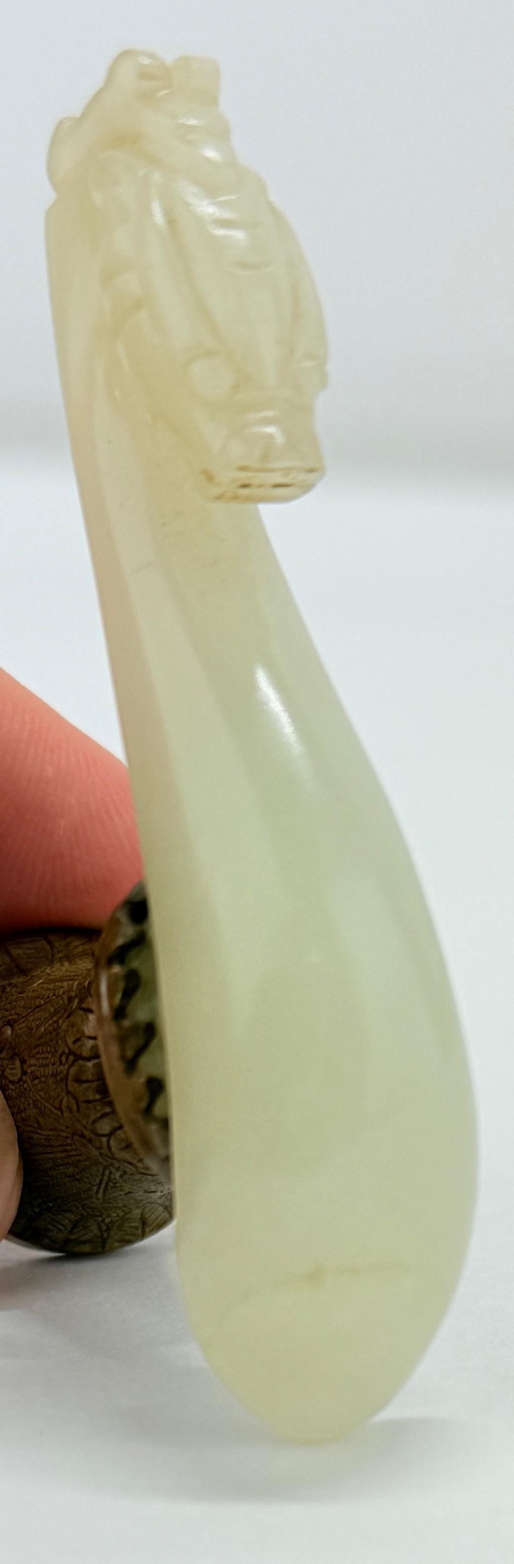 Antique Chinese Qing Dynasty Pale Green Jade Carved Dragon Belt Hook w/ Stand For Sale 7