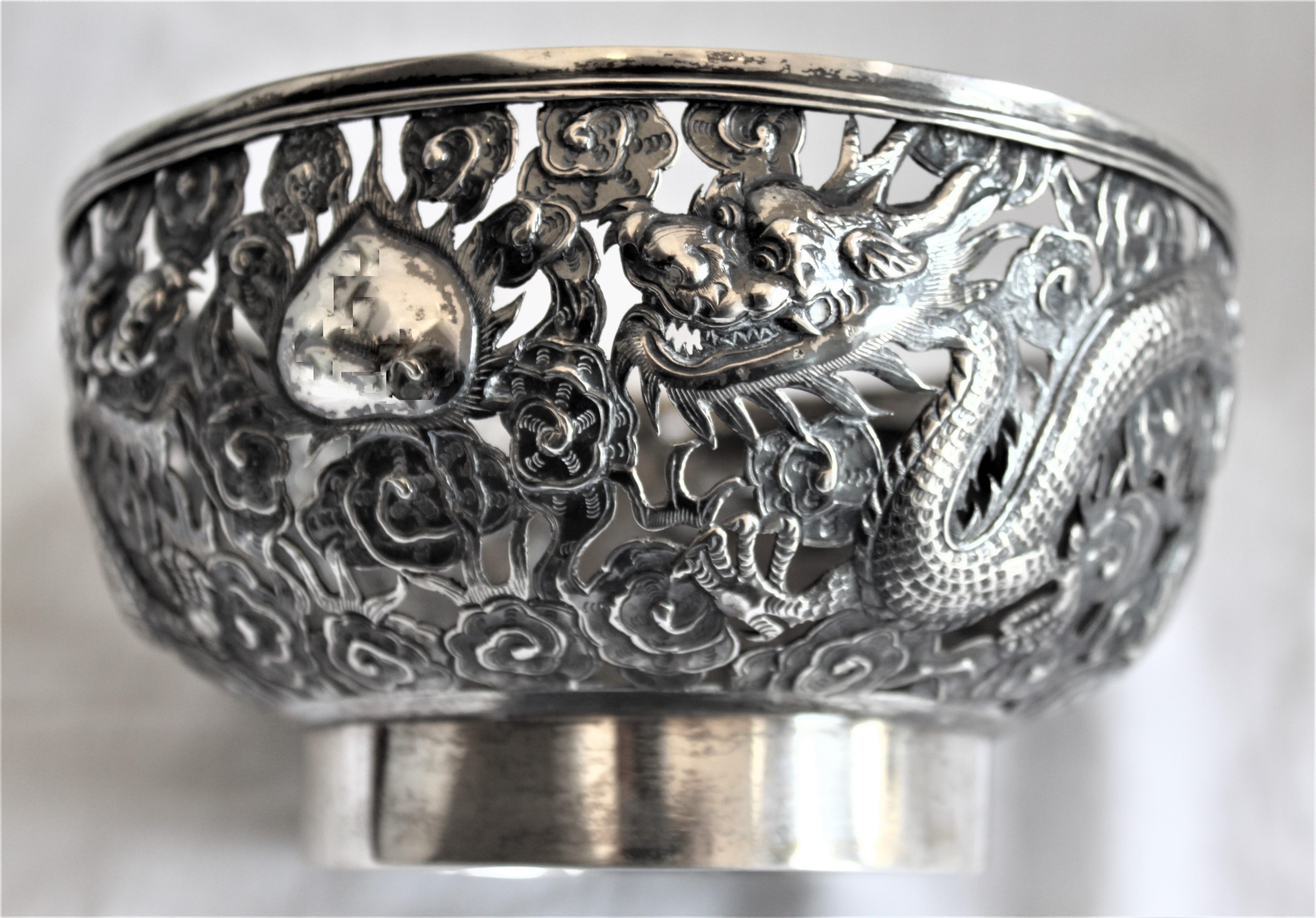Hand-Crafted Antique Chinese Qing Dynasty Silver Bowl with Dragons and Flower Decoration For Sale