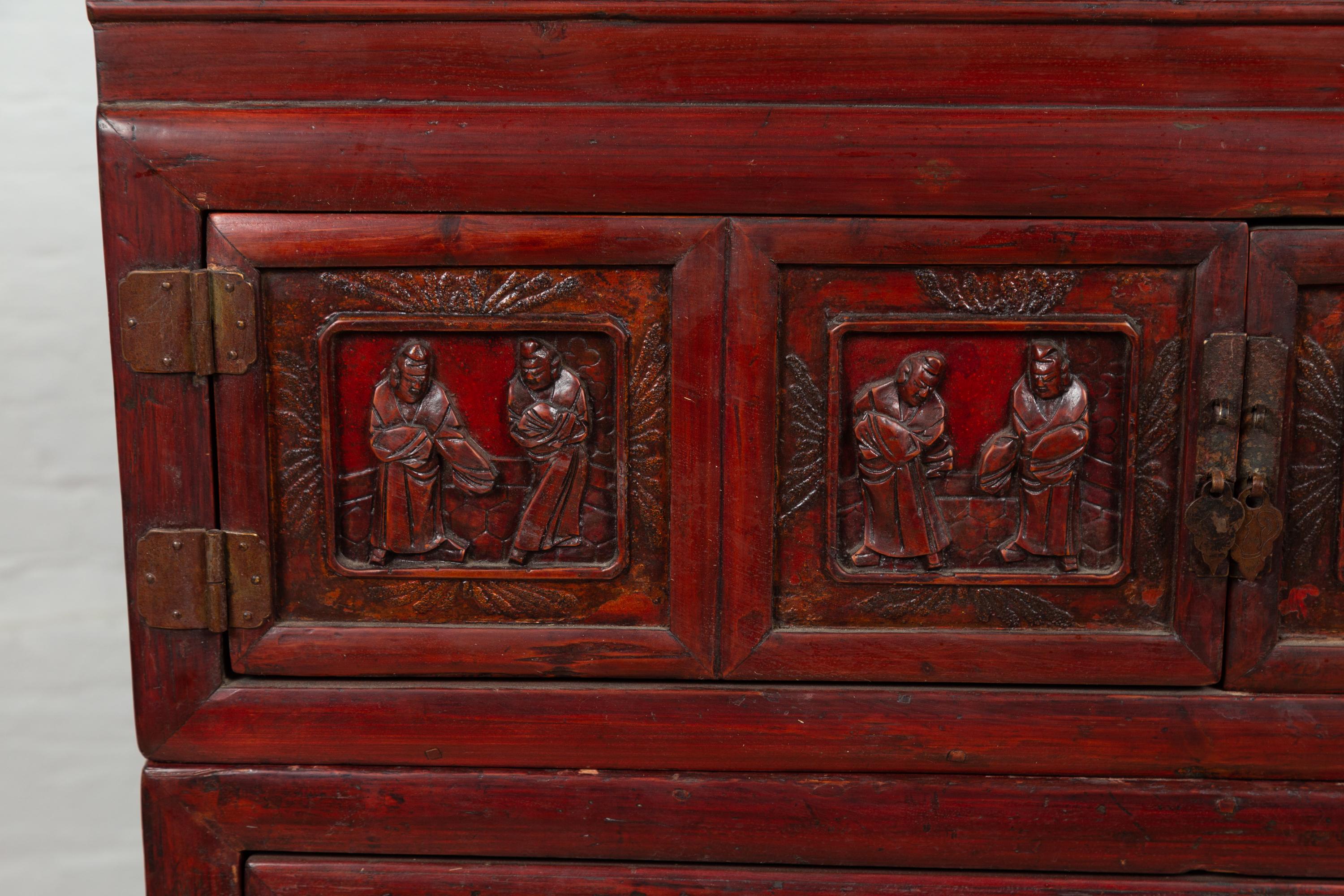 Antique Chinese Red and Black Lacquered Three-Section Chest with Carved Figures In Good Condition For Sale In Yonkers, NY