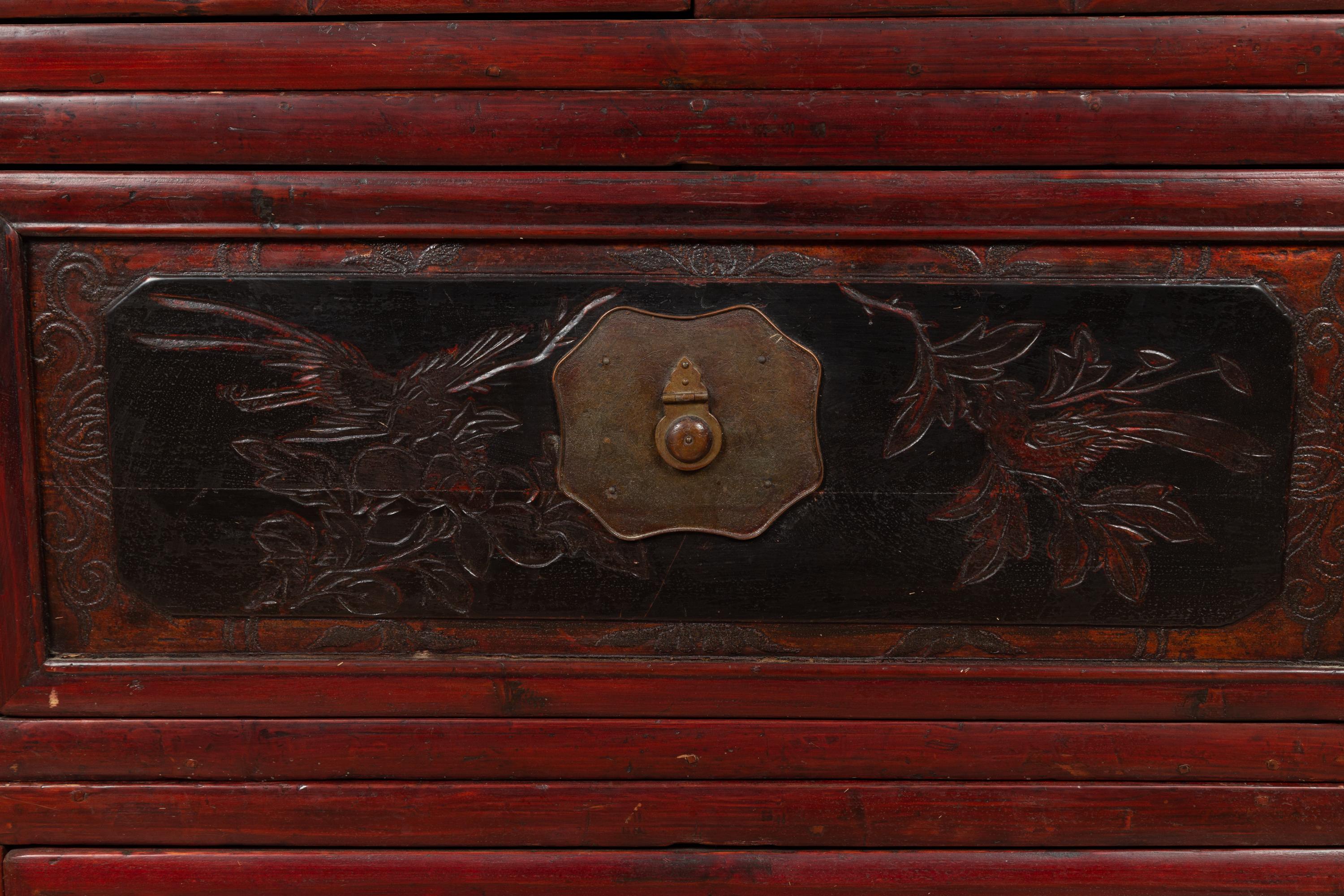 Wood Antique Chinese Red and Black Lacquered Three-Section Chest with Carved Figures For Sale