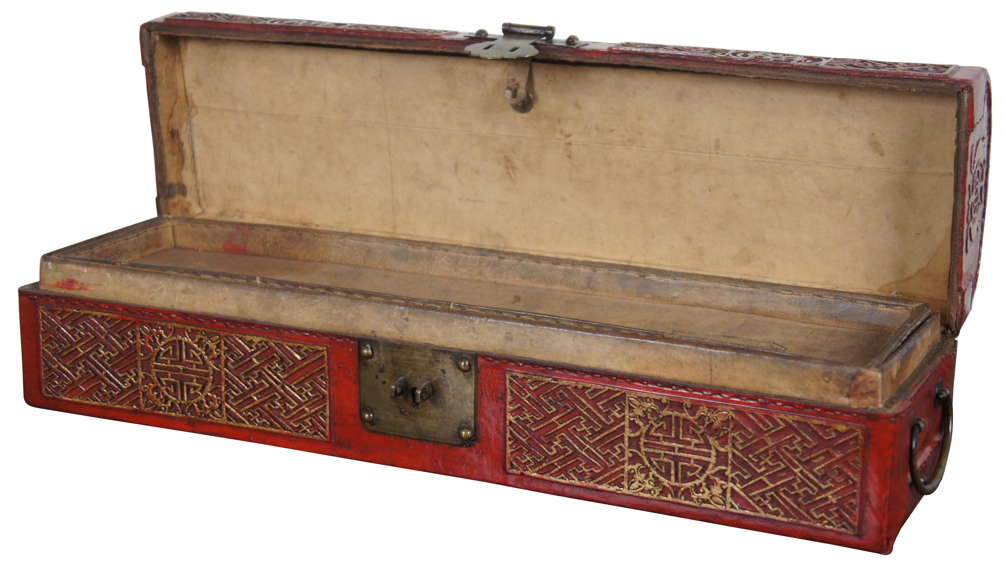 Antique red leather and lacquer Chinese scroll box with gold designs, domed lid, interior tray and brass handles / hardware.
 