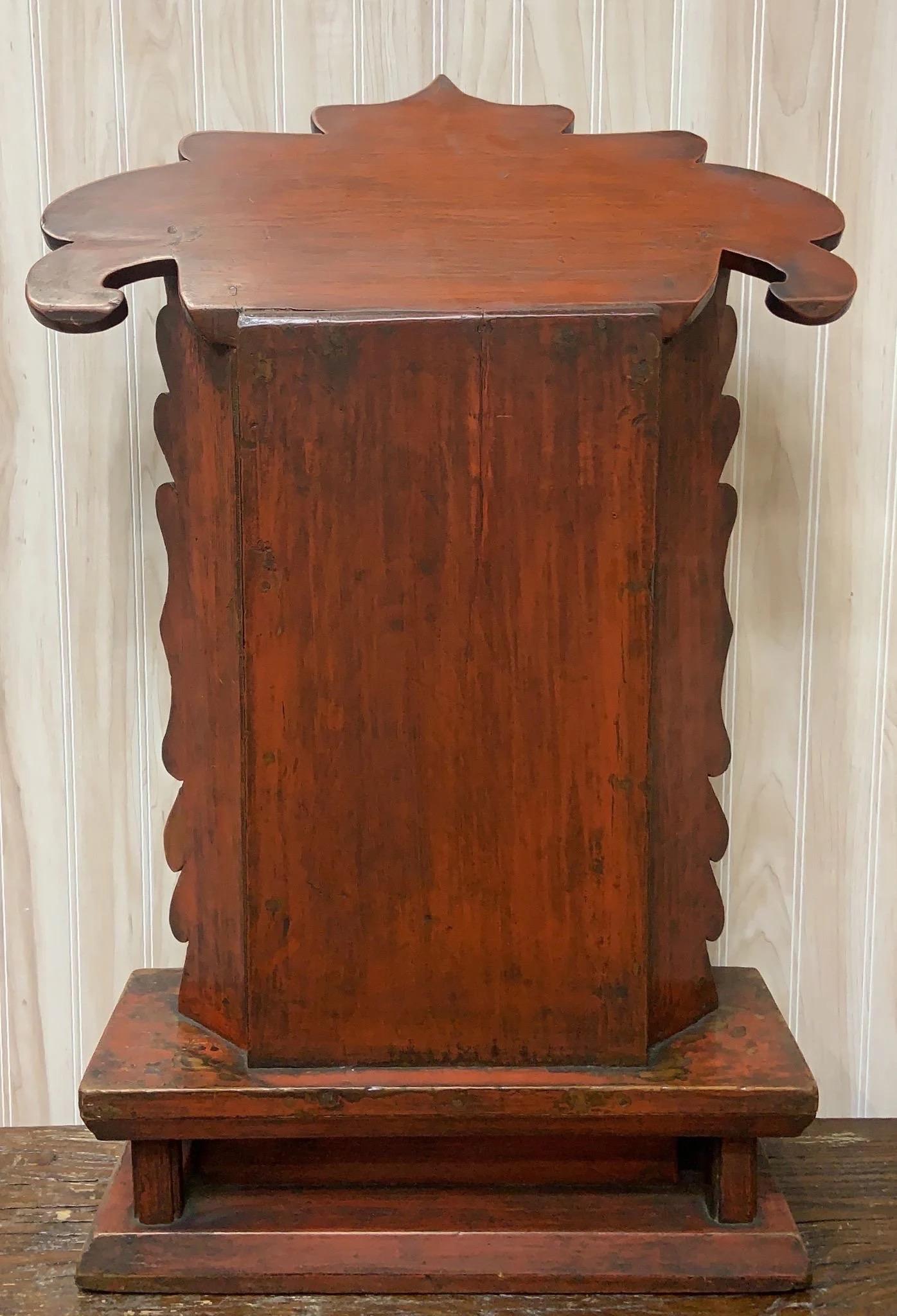 Antique Chinese Red Hand Painted Elm Ancestral Shrine / Altar

Made from durable elm wood, this altar features intricate hand-painted designs in vibrant red hues. With its traditional design and meticulous attention to detail, this altar serves as a