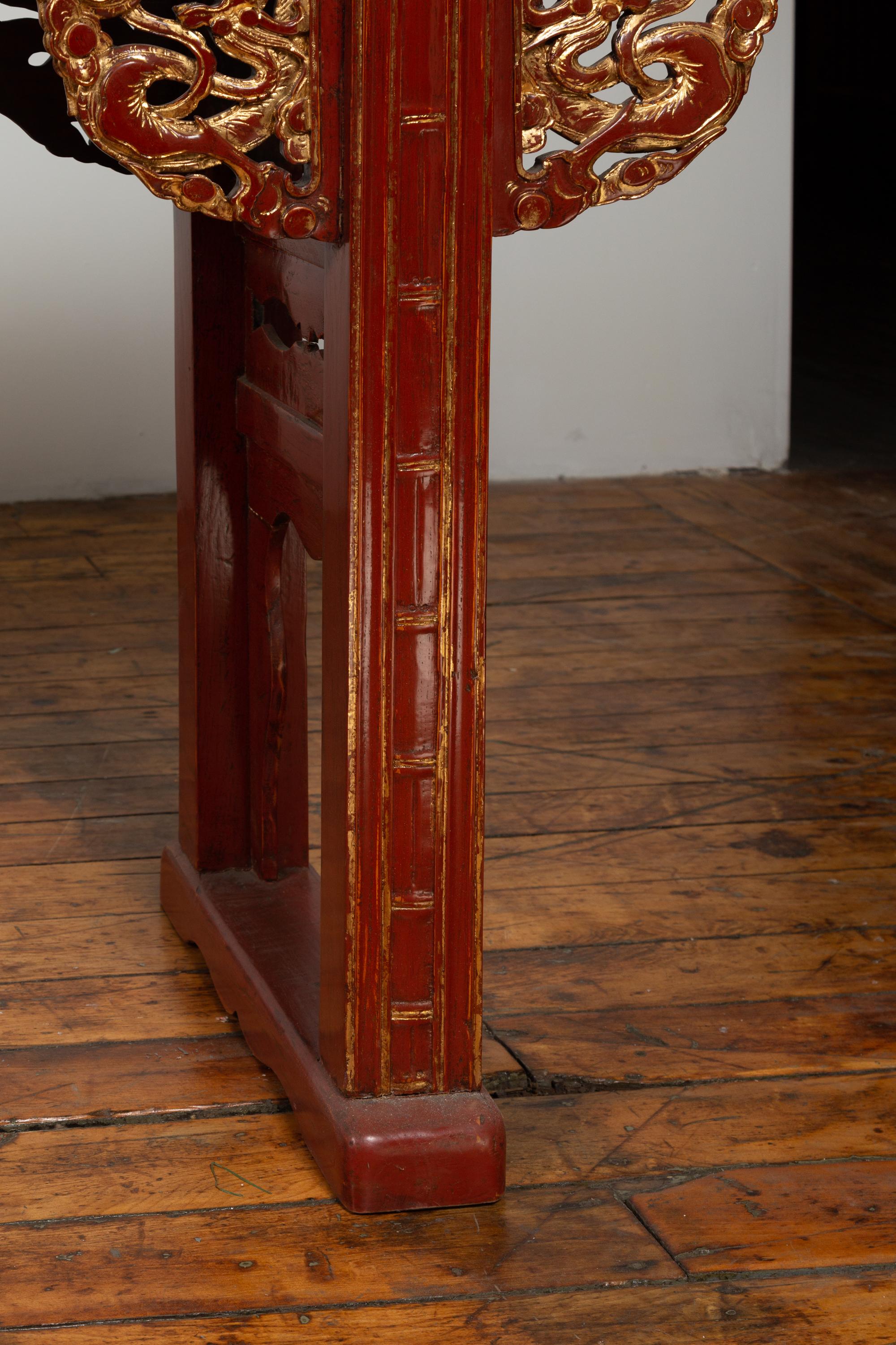 Ming Antique Chinese Red Lacquered Console Table with Gilt Accents and Carved Apron For Sale