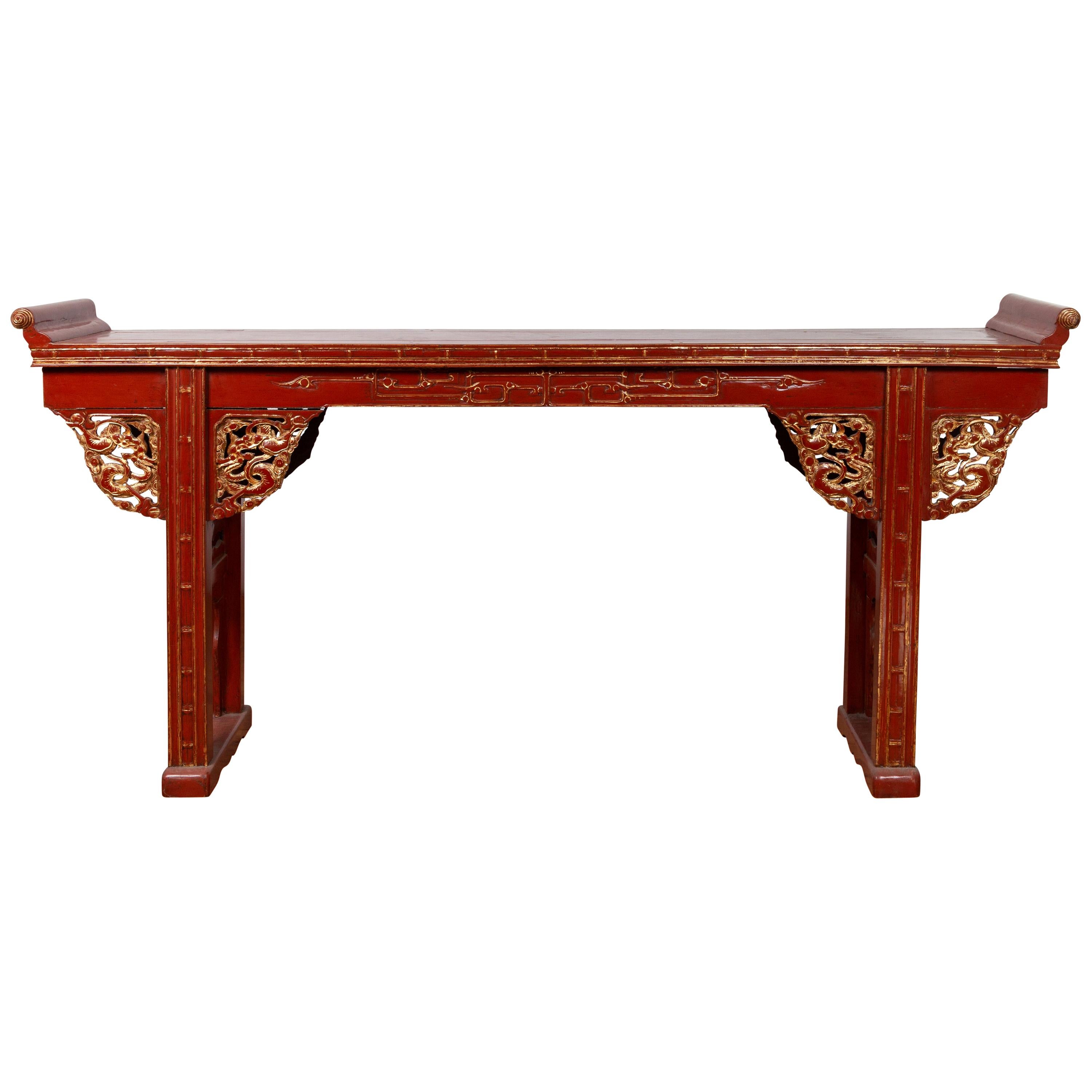 Antique Chinese Red Lacquered Console Table with Gilt Accents and Carved Apron