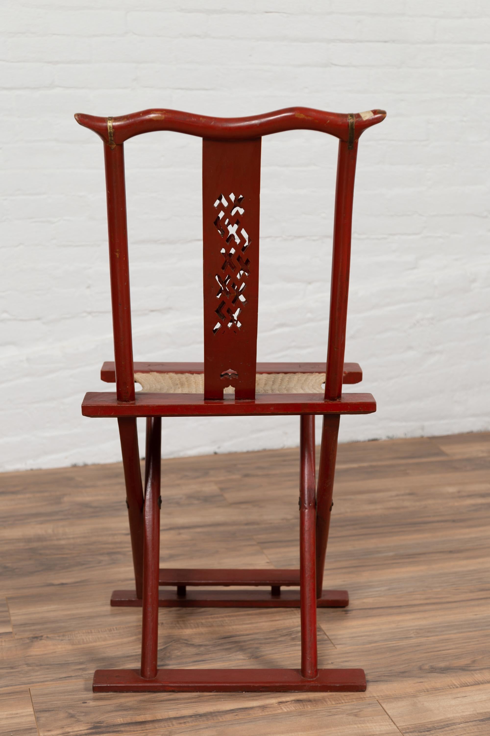 Antique Chinese Red Lacquered Folding Traveller’s Chair with Footrest and Fabric For Sale 5