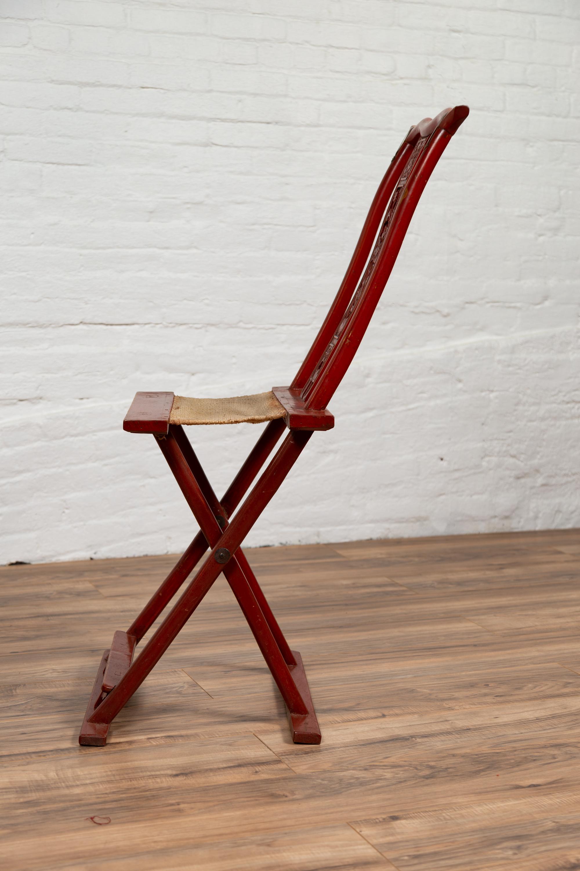 Antique Red Lacquered Folding Traveller’s Chair with Footrest and Fabric For Sale 5