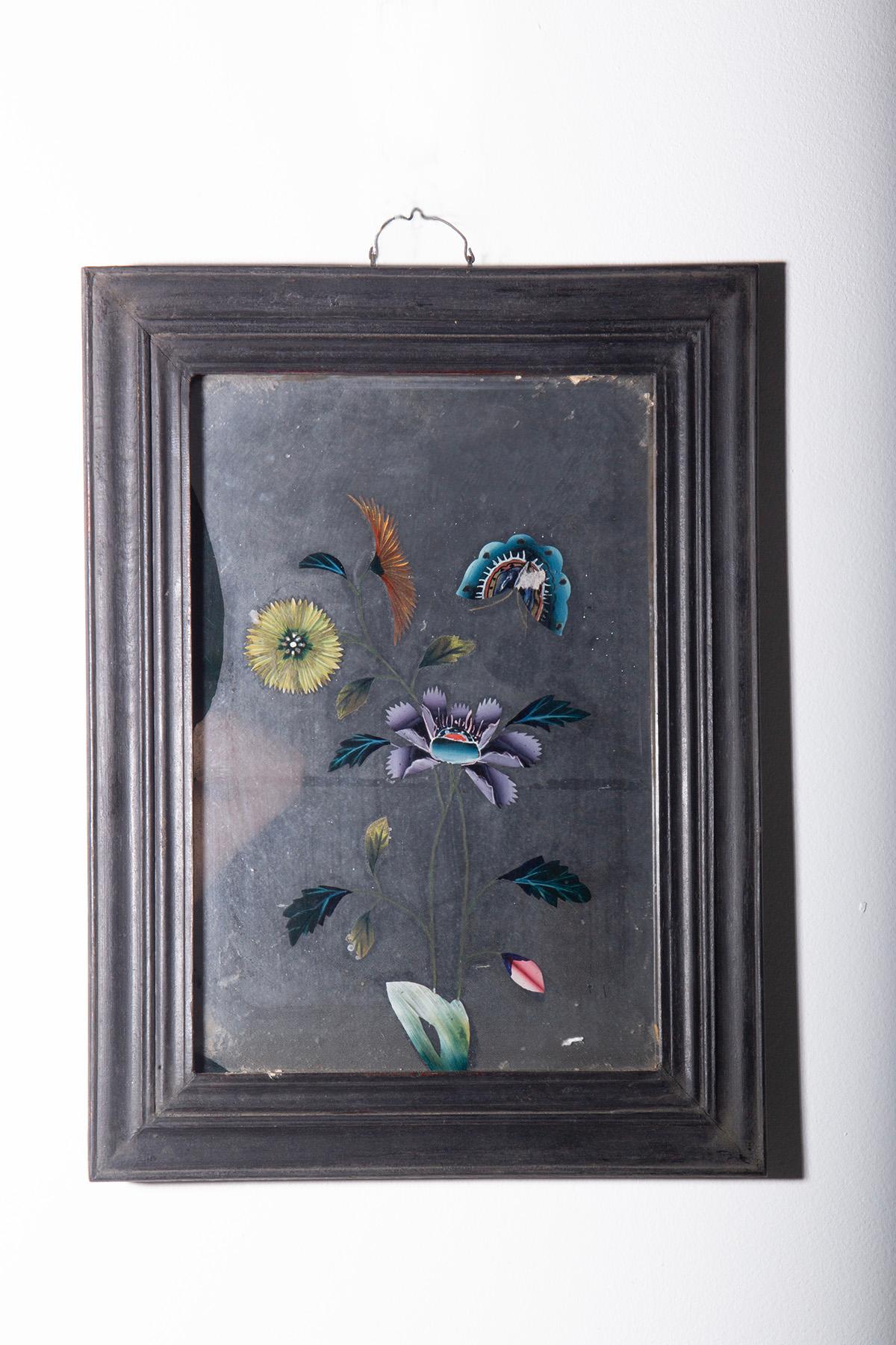 Fascinating 19th-century Chinese mirror painting depicting traditional Chinese interiors with flowers in vases placed on wooden stands, bonsai trees in ceramic planters, books, and other details reminiscent of the artistic culture of the time. This