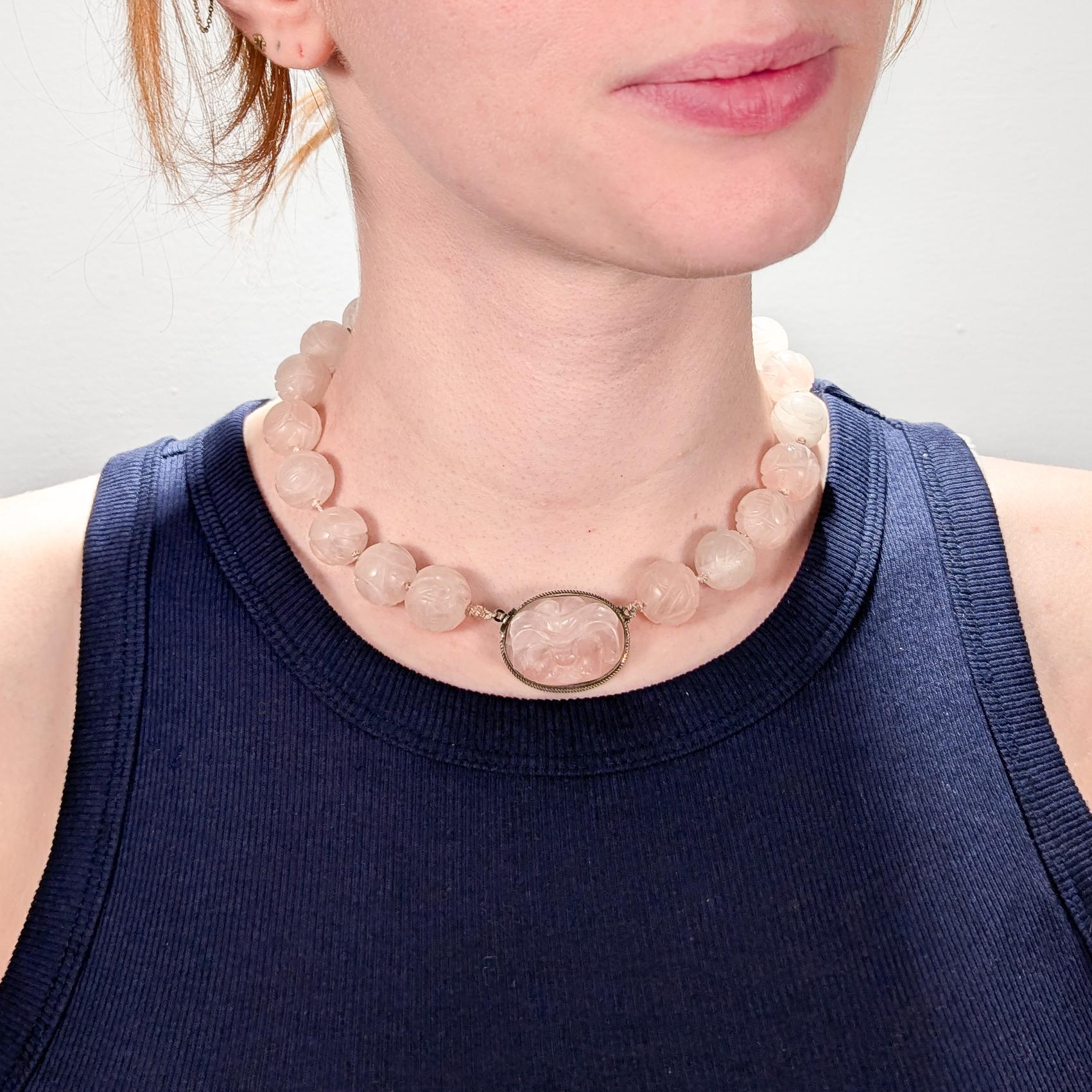A very fine, antique Chinese beaded jade necklace.  

With large hand knotted, 16 mm carved rose quartz beads and a sterling mounted clasp. 

It retains its original John Wanamaker box.  The box reads: The Oriental Shop / Philadelphia / New York /