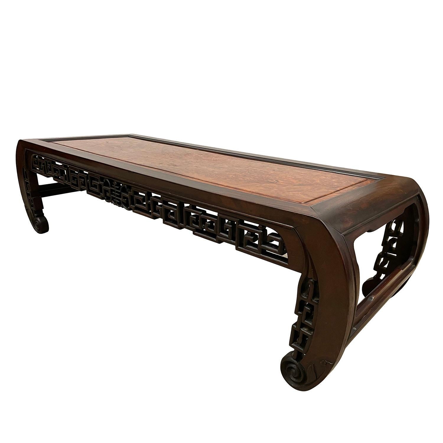 Size: 13in H x 49in W x 17.5in D
Origin: China
Circa: 1900 - 1940
Material: Rosewood with Burl wood on top
Condition: Original finish, solid wood construction, hand carved, sturdy, normal age wear.

Look at this beautiful carved Coffee Table.