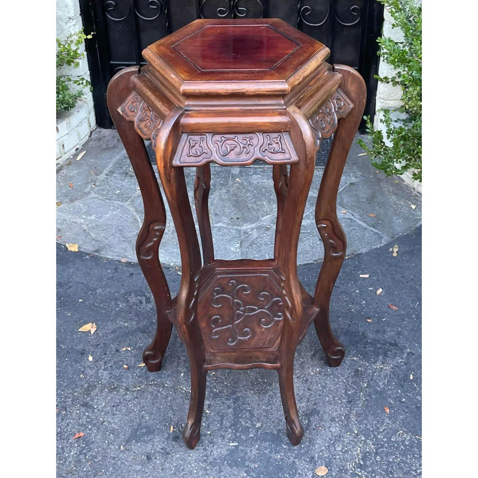 Antique Chinese rosewood pedestal plant stand/ It is beautifully carved in solid rosewood with six legs and a hexagonal top.

Additional information: 
Materials: Rosewood
Please note that this item contains materials that are legally subject to