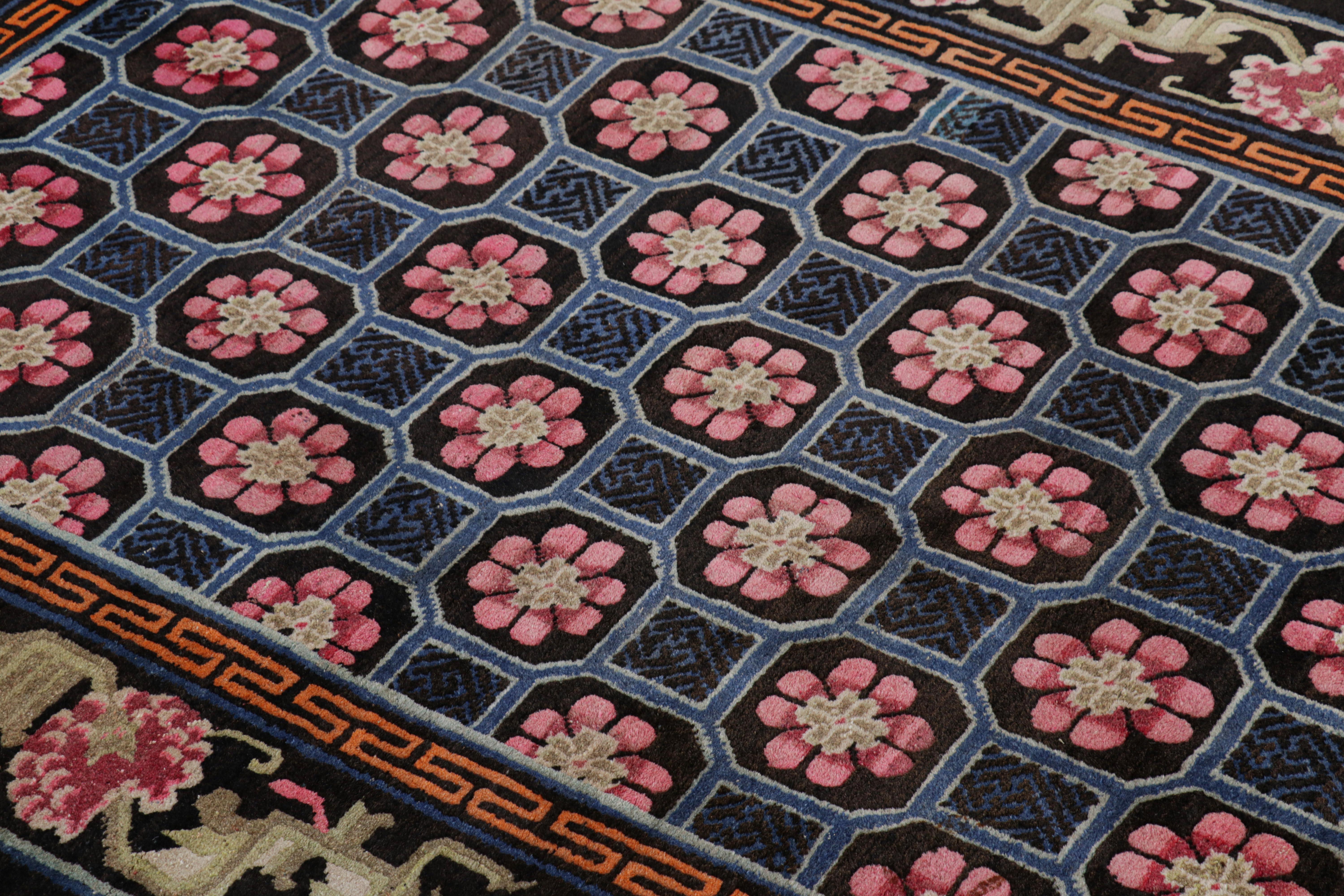 Hand-knotted in wool circa 1910-1920, this 4x6 antique Chinese rug is a remarkable signature piece from China. It features colorful medallions and floral patterns that seem to be inspired by Chinese ceramic tiles with the lotus motif.  

On the