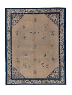 Antique Chinese Rug with Warm Ecru Field and Blue Design, Circa 1920's
