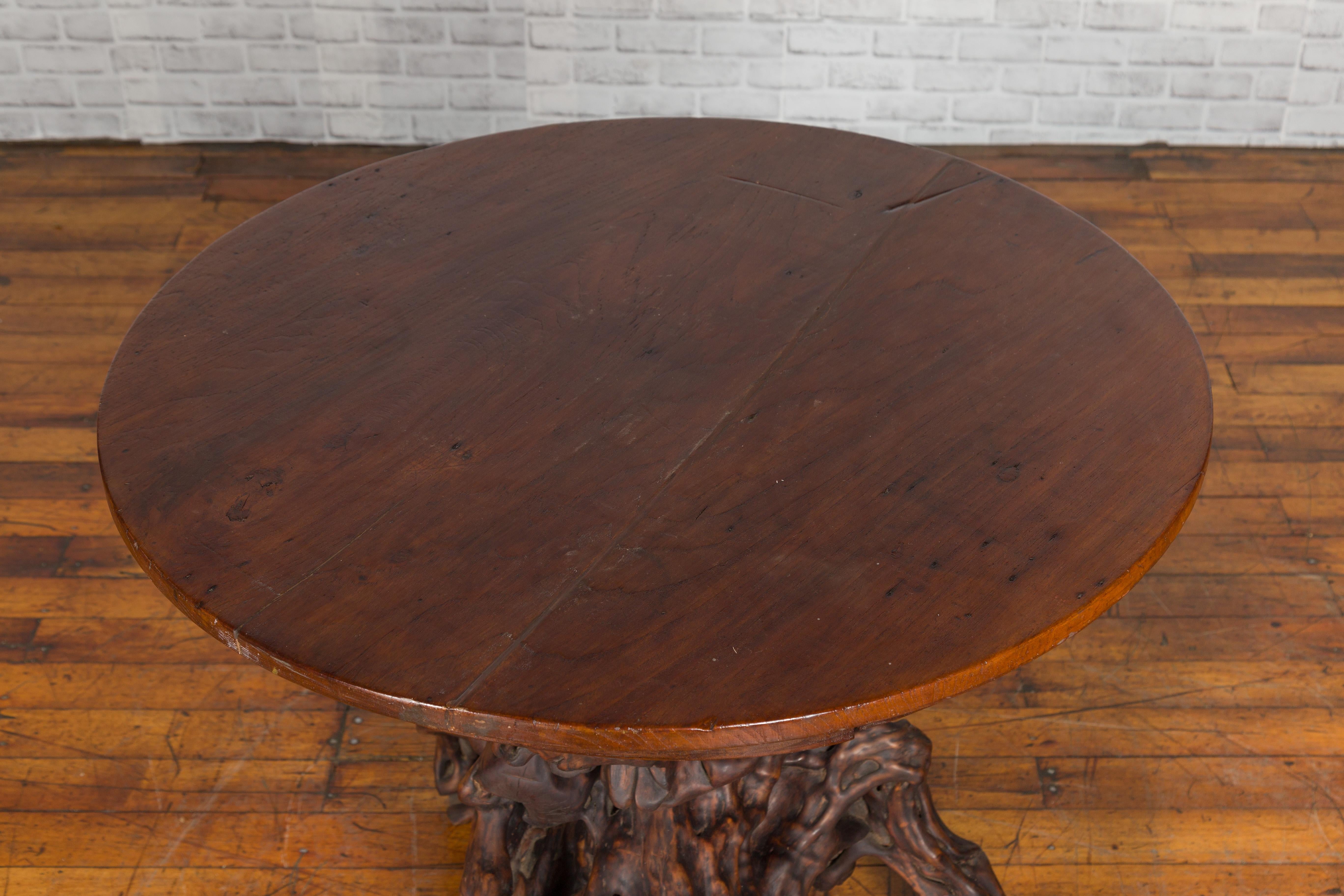 Antique Chinese Rustic Root Table with Circular Top and Dark Patina 6