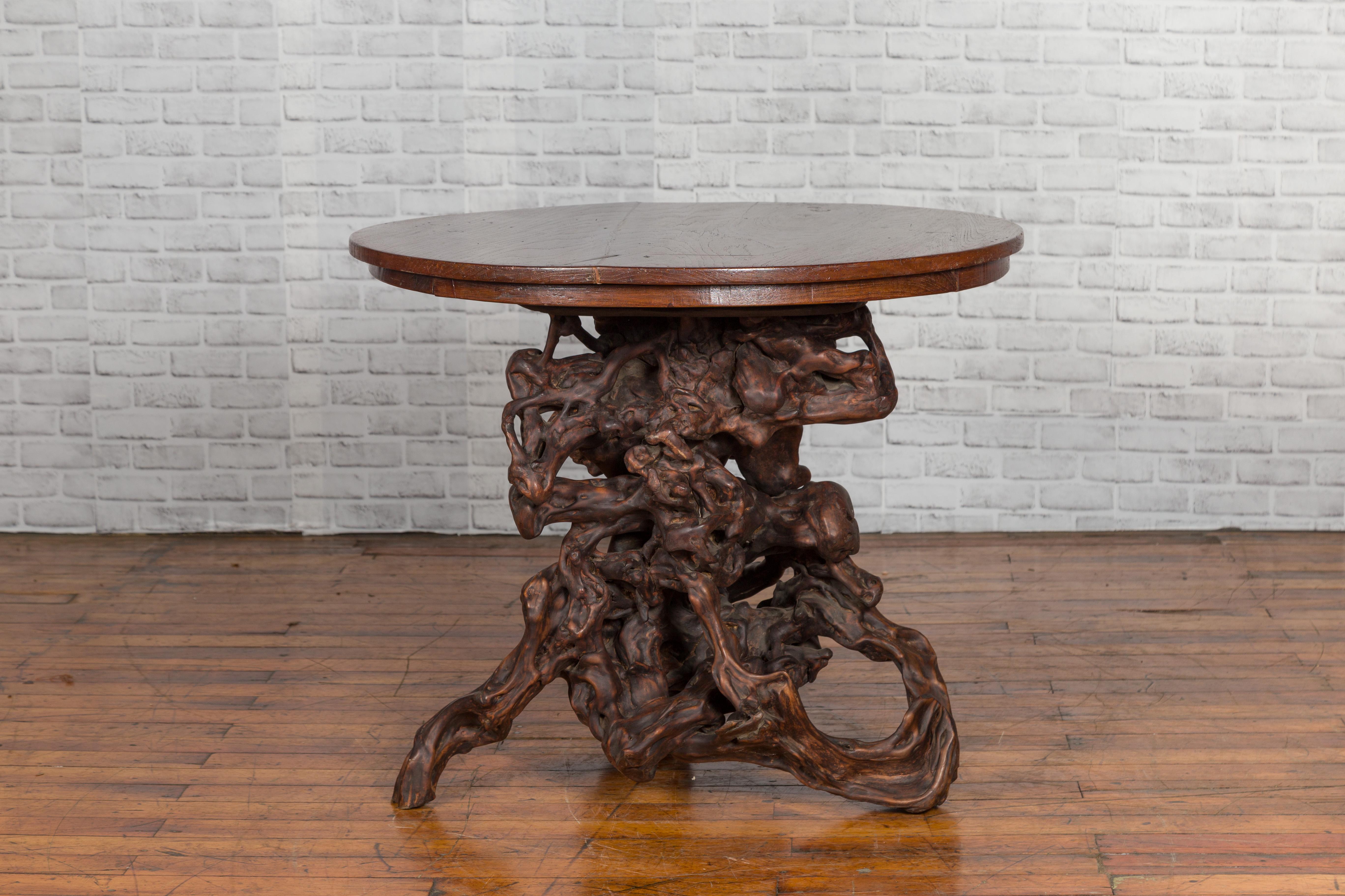20th Century Antique Chinese Rustic Root Table with Circular Top and Dark Patina