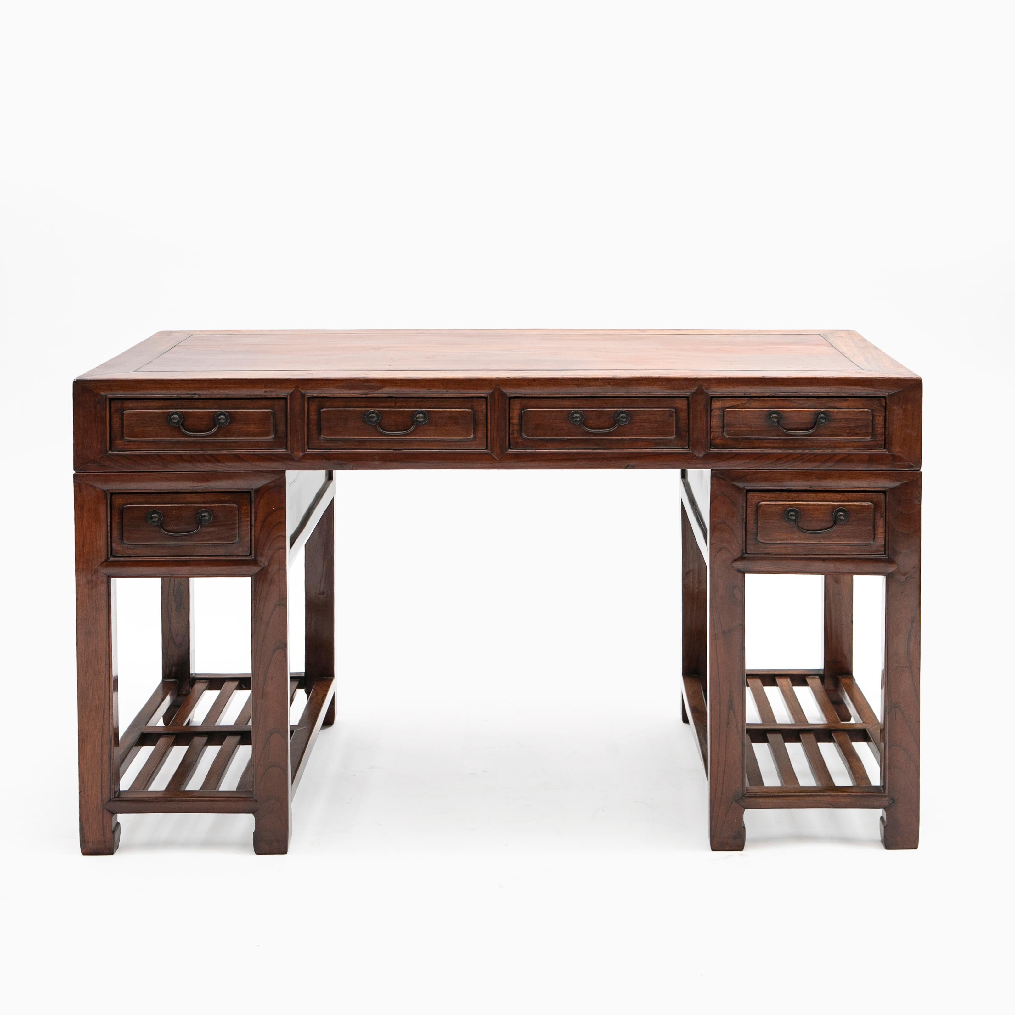 3 part Doctor's desk or Scholar desk in Jumu wood from the city of Suzhou in China, approx. 1900.
Center tabletop made in one piece of wood, which has shrunk over time and therefore is filled with a hard black wax along the sides.
Jumu wood is also
