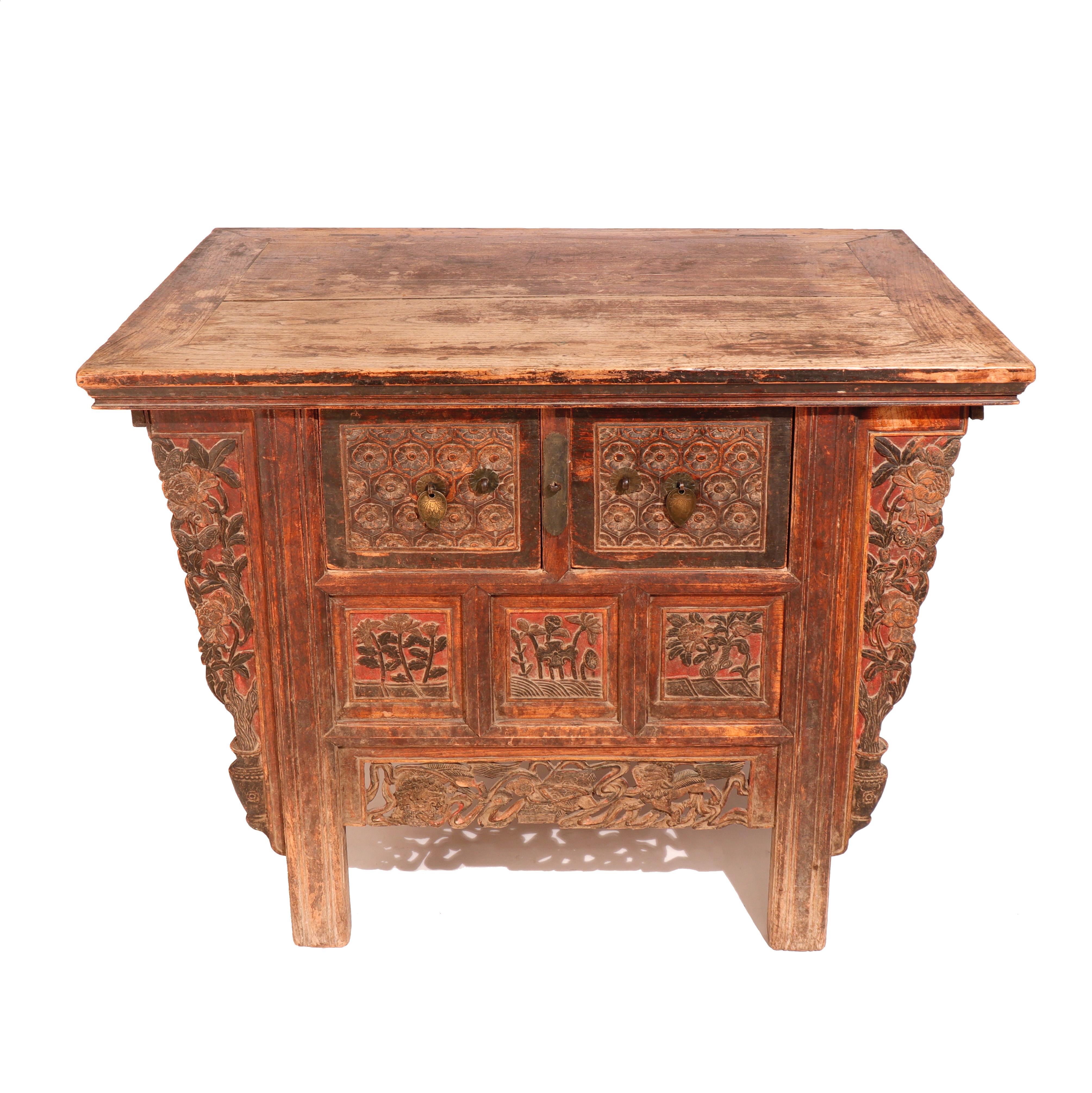 Chinese Shanxi 2 - Drawer Cabinet,  a sturdy and broad traditional altar coffer cabinet from Shanxi Province. Constructed of Elm (Yumu) having a wood plank top, two large drawers with a repeating pattern of hexagonal honeycomb flower blossoms and