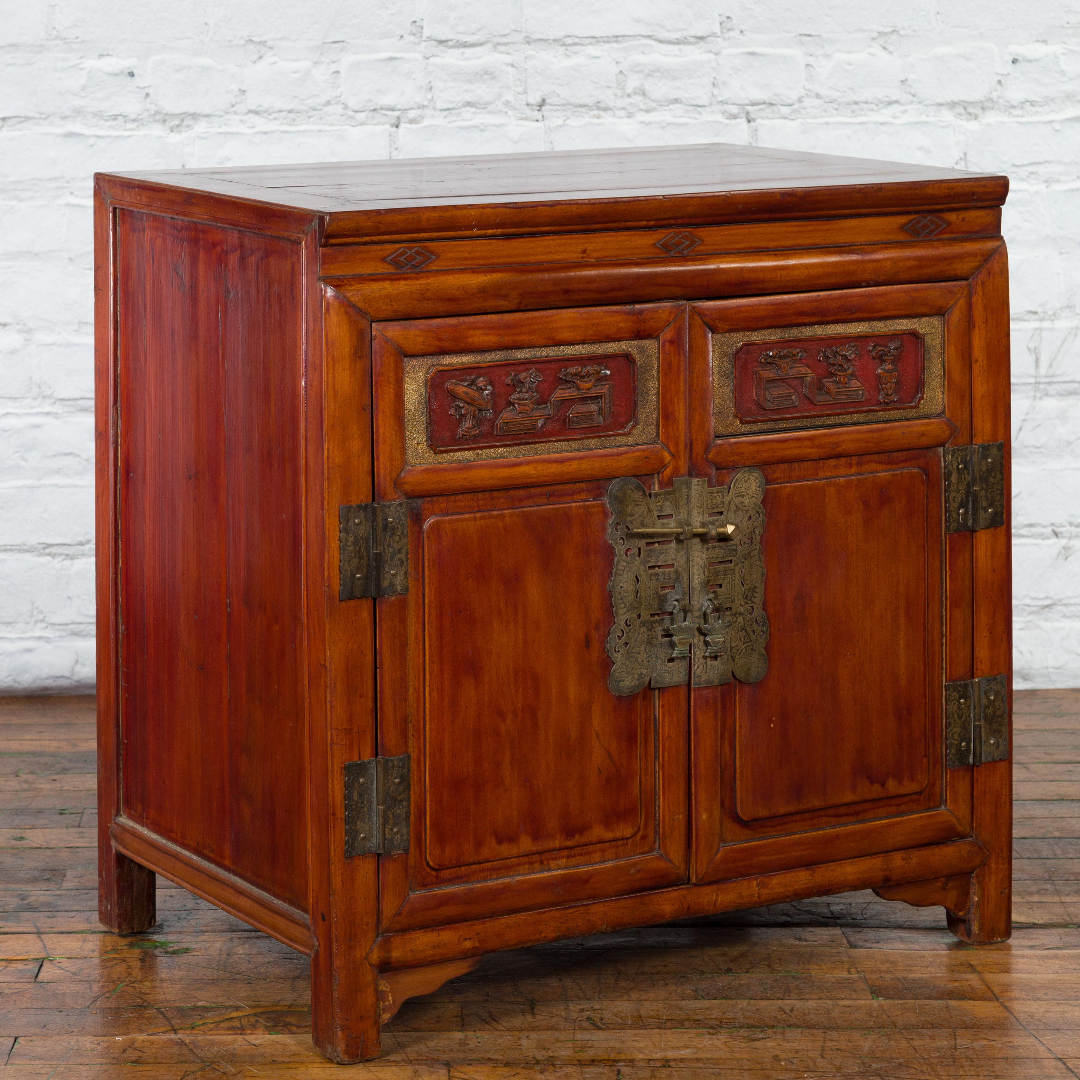 Antique Chinese Side Cabinet with Carved Panels, Gilt Accents and Hidden Drawers In Good Condition For Sale In Yonkers, NY