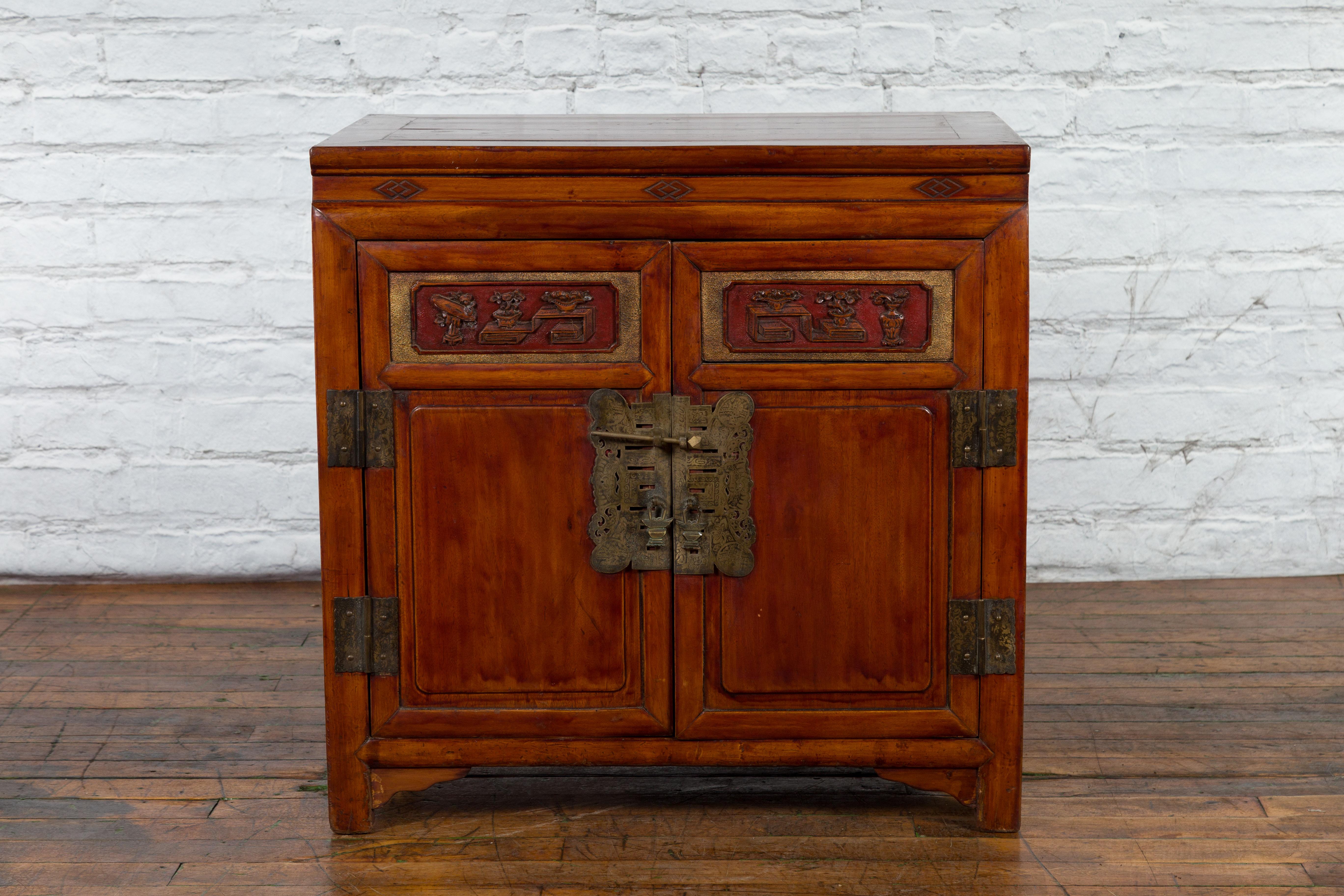 Antique Chinese Side Cabinet with Carved Panels, Gilt Accents and Hidden Drawers For Sale 1