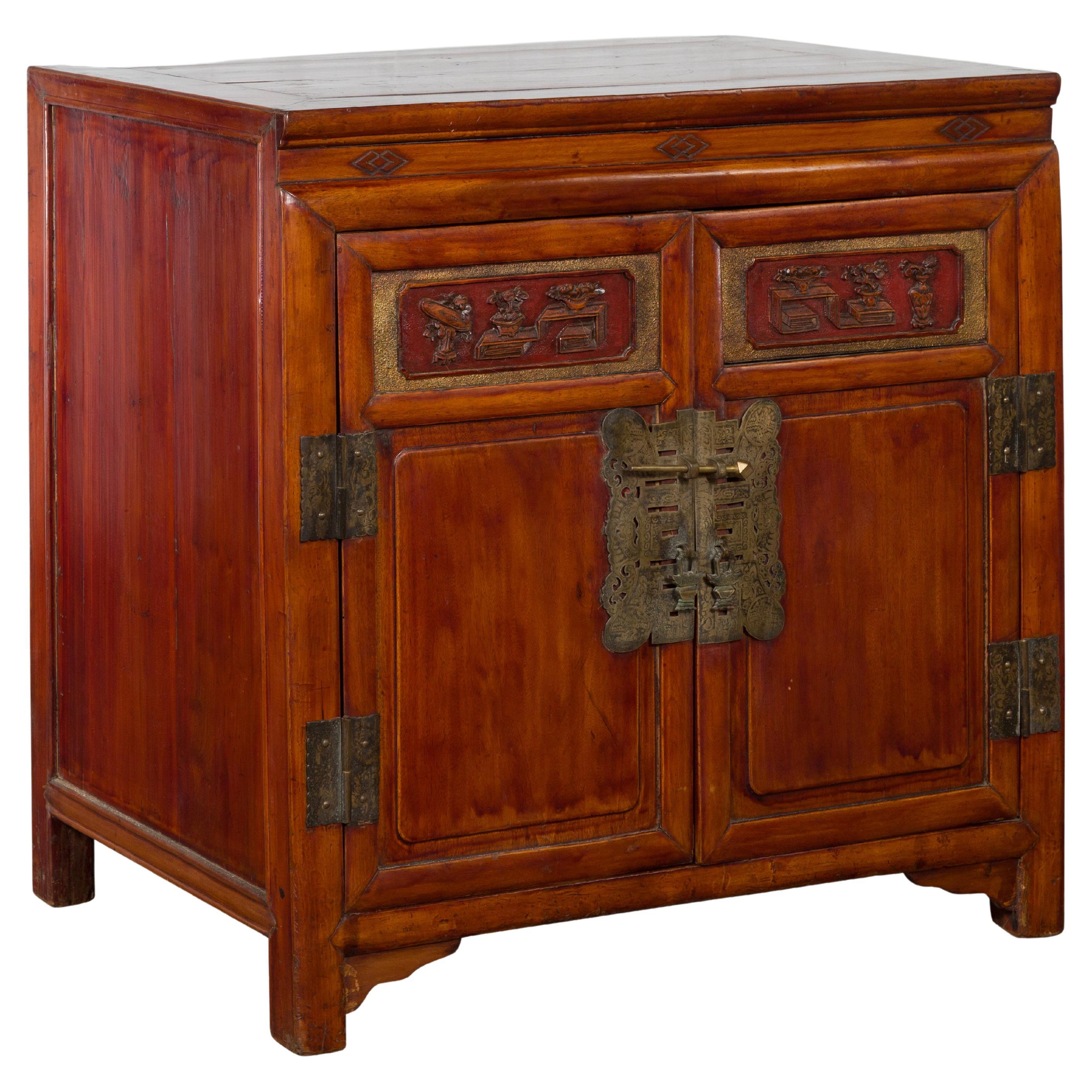 Antique Chinese Side Cabinet with Carved Panels, Gilt Accents and Hidden Drawers For Sale