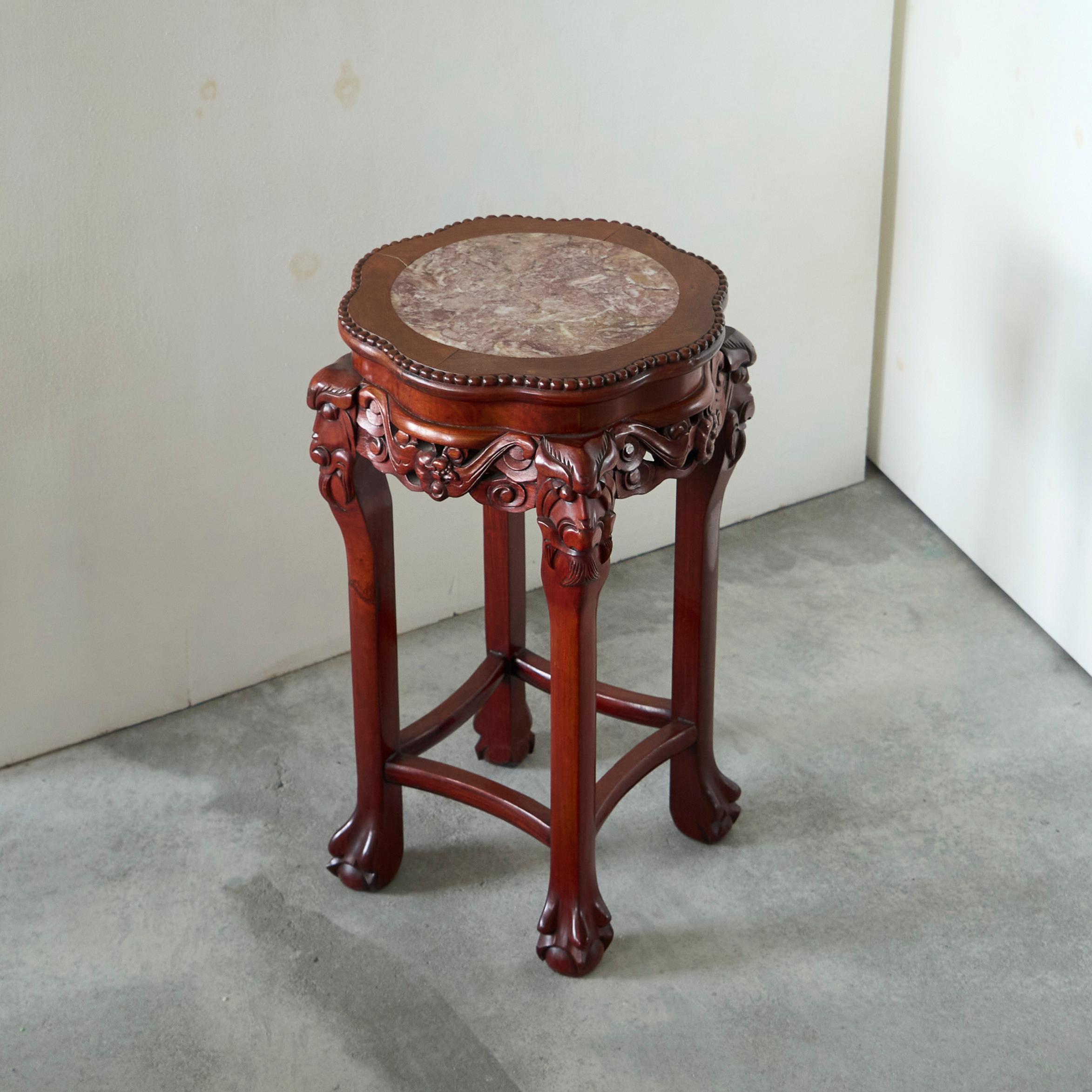 Antique Chinese Side Table in Carved Wood and Marble.

Beautiful antique Chinese occasional table in carved wood and inlaid marble. Wonderful shape and proportions. Great to use as a side table, a bedside table or as a little center table. 

Comes