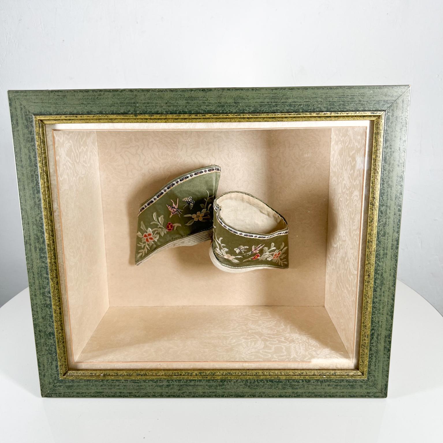 Antique Chinese green silk embroidered bound feet bind lotus shoes in shadow box
Green floral
13.63 w x 11.75 h x 6 d
Original unrestored antique vintage condition.
See images provided please.