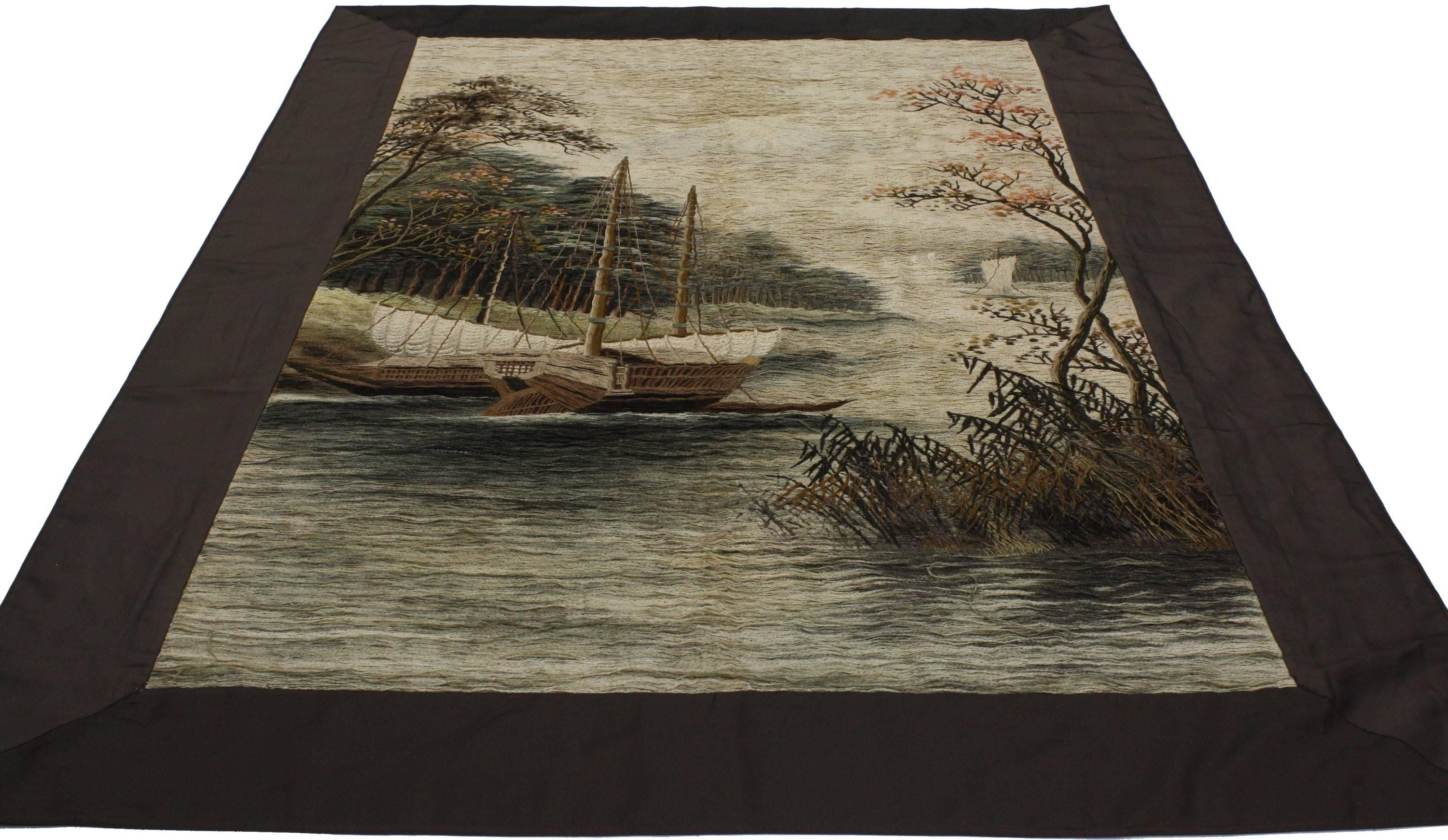 71052, antique Chinese silk embroidered tapestry. This handwoven silk antique Chinese embroidered tapestry features a soothing nautical scene. River waters pour gently into the foreground while three small boats are docked along the banks. What