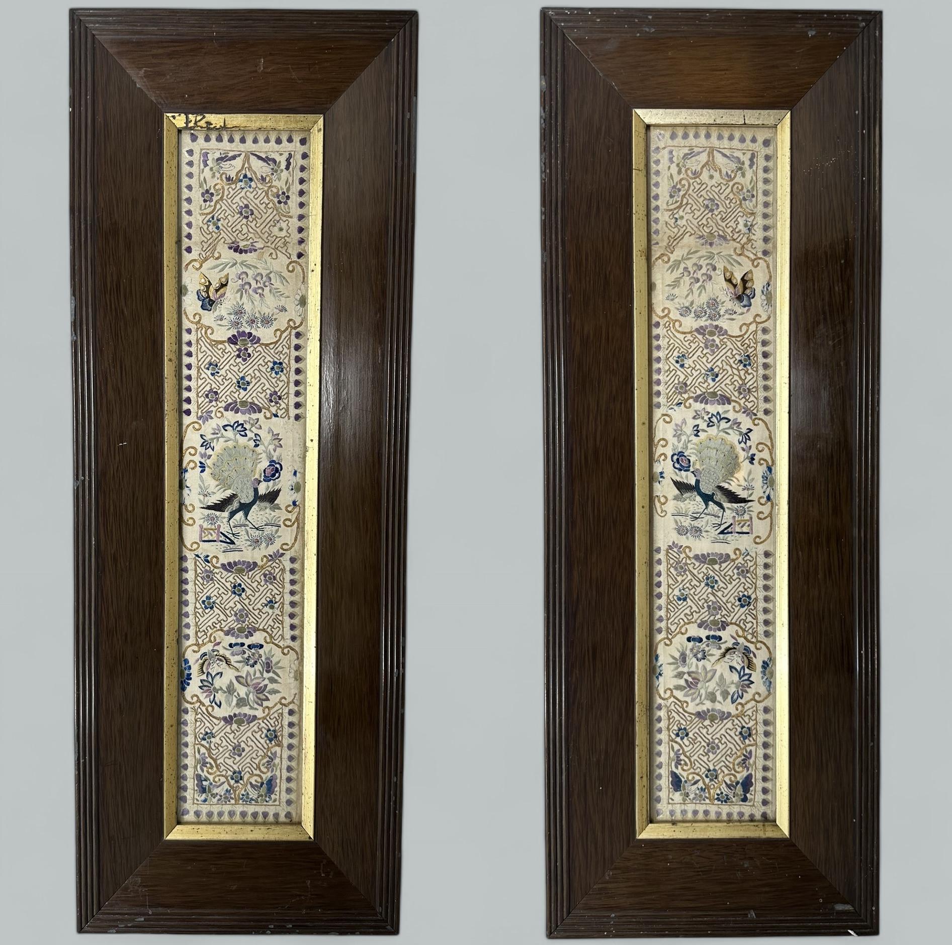 An absolutely stunning and quite rare pair of framed Asian hand embroidered on woven silk Framed Pictures, made during the third quarter of the Nineteenth Century of Chinese origin. 

Each depicting Peacocks and exotic butterflies with segments of