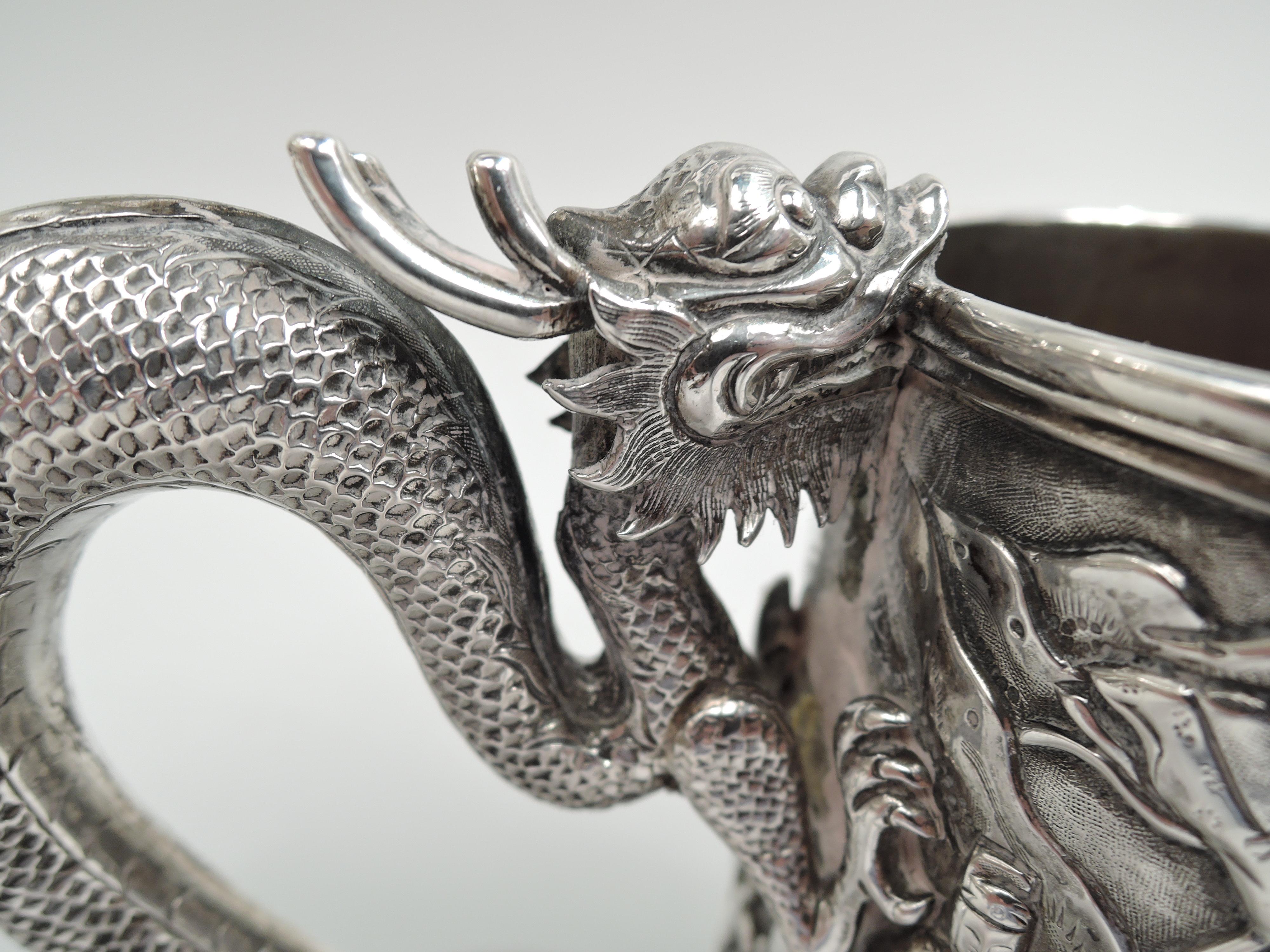19th Century Antique Chinese Silver Battle Mug with Dramatic Dragon Handle For Sale