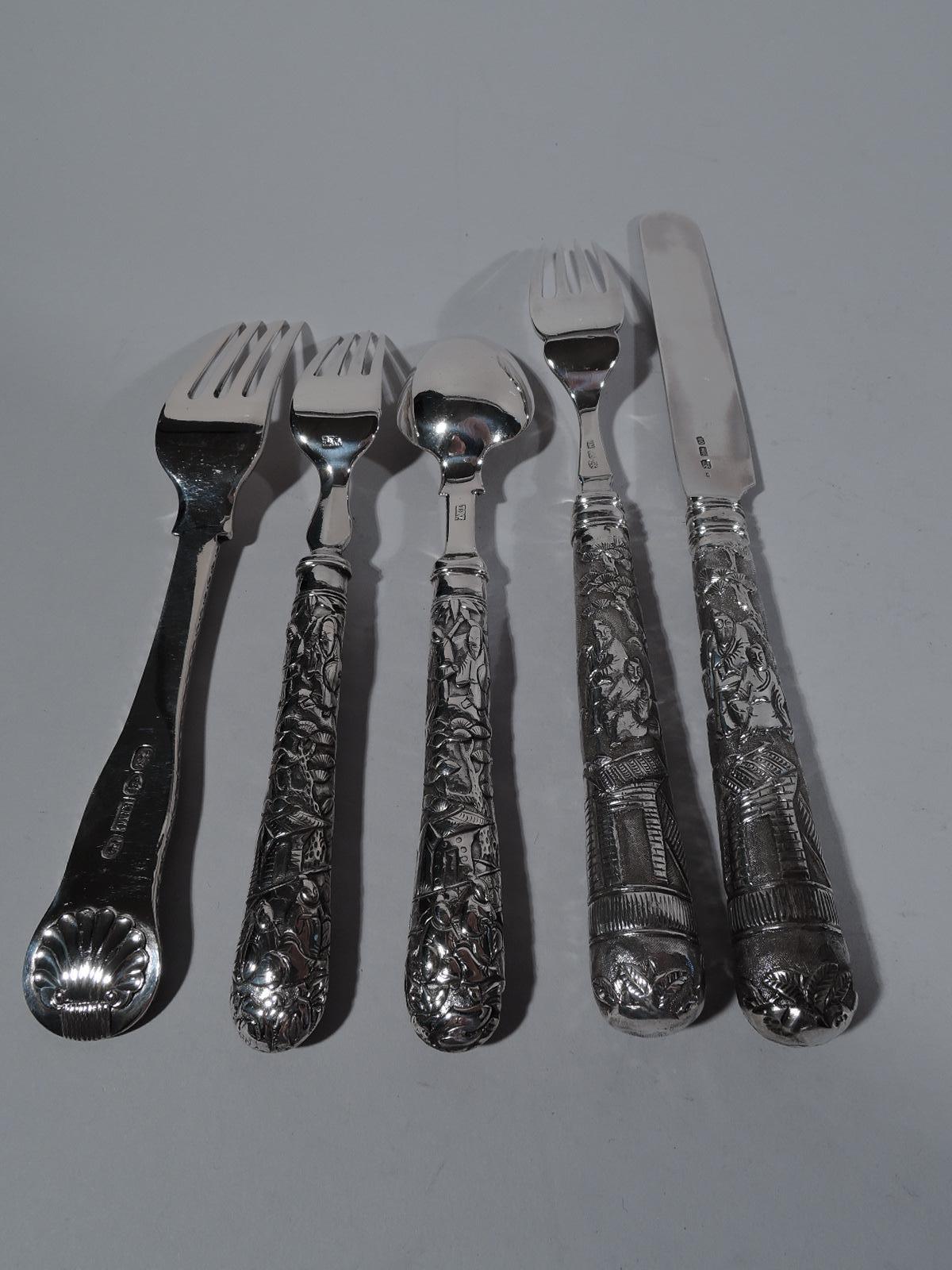 Turn-of-the-century Chinese export silver place setting with: (dimensions in inches) dinner fork (7 3/4), salad fork (6 3/4), spoon (6 5/8), and knife (8 1/2). Each: Hollow handle with chased exotic scenes: robed Chinamen, pagodas, and trees. Knife