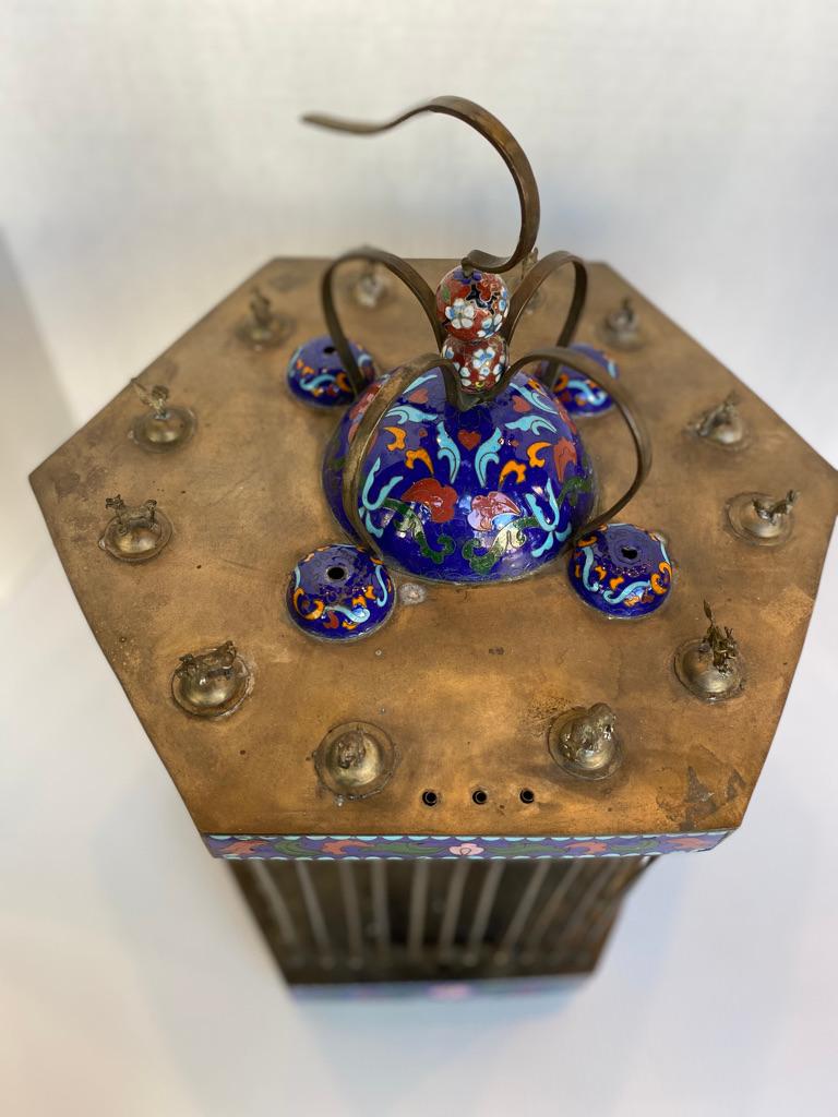 This Birdcage is unique Birdcage handmade and molded Chinese silver having molded silver animals of the zodiac sitting atop then cloisonne' finish to the top hanger area, trim to the sides and bottom. Inside the cage is a hand painted painting of a