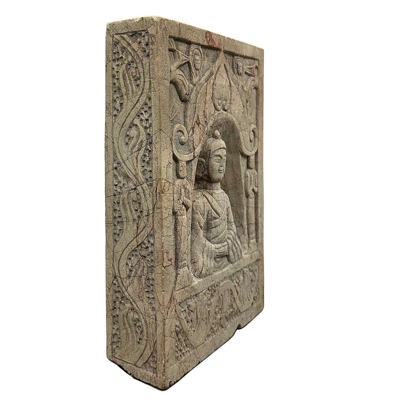 A Chinese antique carved stone wall plaque with traces of original polymorphic and nice patina. Crafted in China, this carved stone wall plaque will make for an exquisite decorative addition. Featuring a vertical format skillfully adorned with a